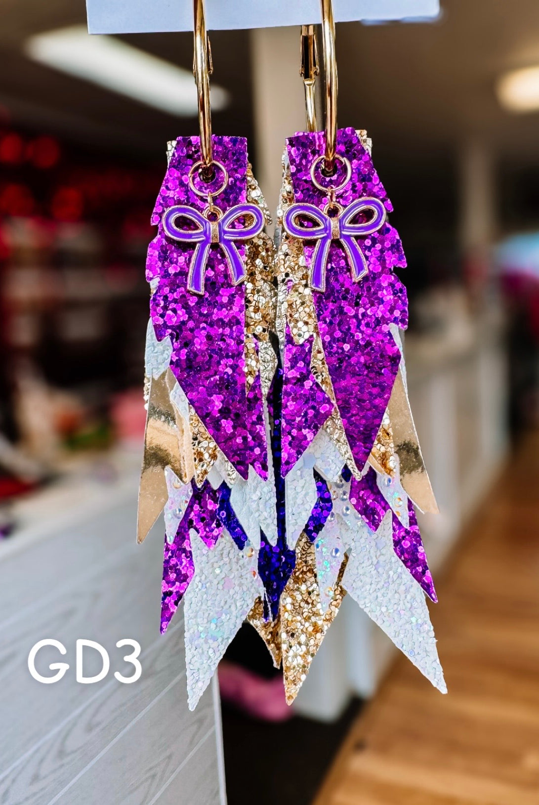 Jak Sprat Game Day Collection: Charmed Fabulous Feather-Earrings-Dear Me Southern Boutique, located in DeRidder, Louisiana