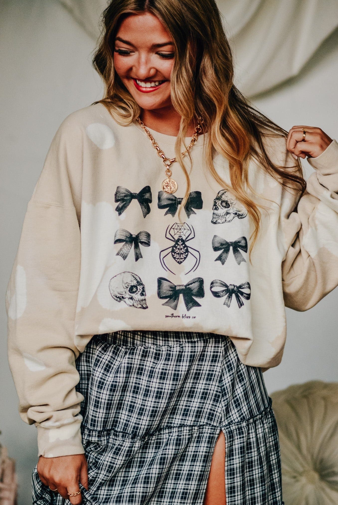 Bows and Skulls Bomba Sweatshirt-Dear Me Southern Boutique, located in DeRidder, Louisiana