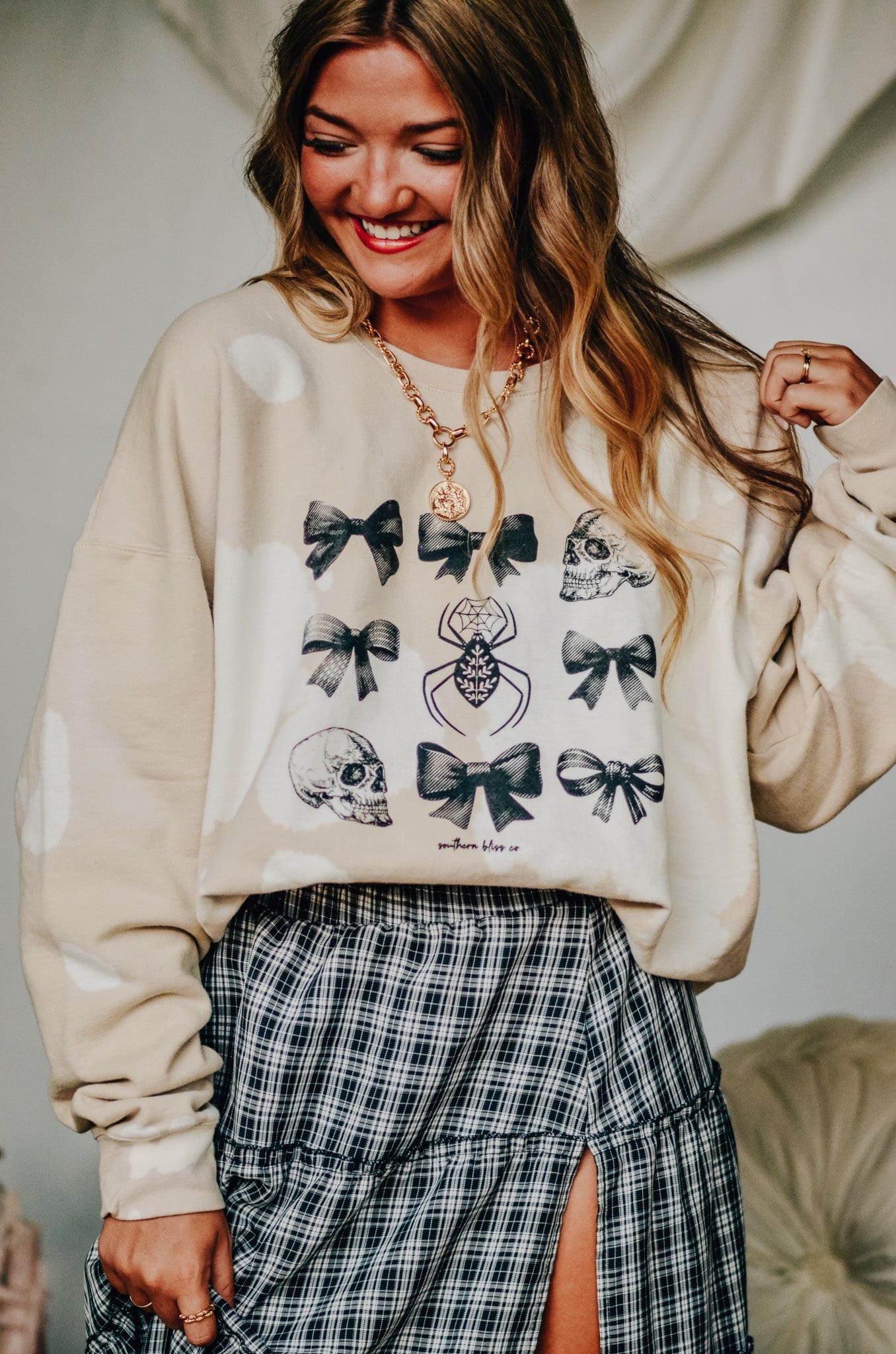 Bows and Skulls Bomba Sweatshirt-Dear Me Southern Boutique, located in DeRidder, Louisiana