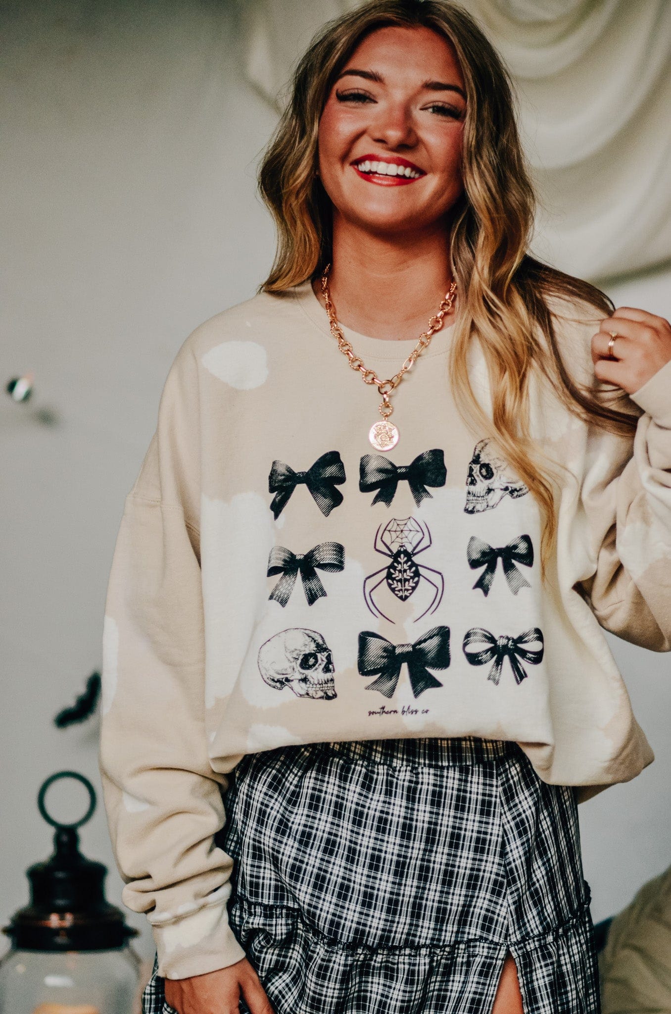 Bows and Skulls Bomba Sweatshirt-Dear Me Southern Boutique, located in DeRidder, Louisiana