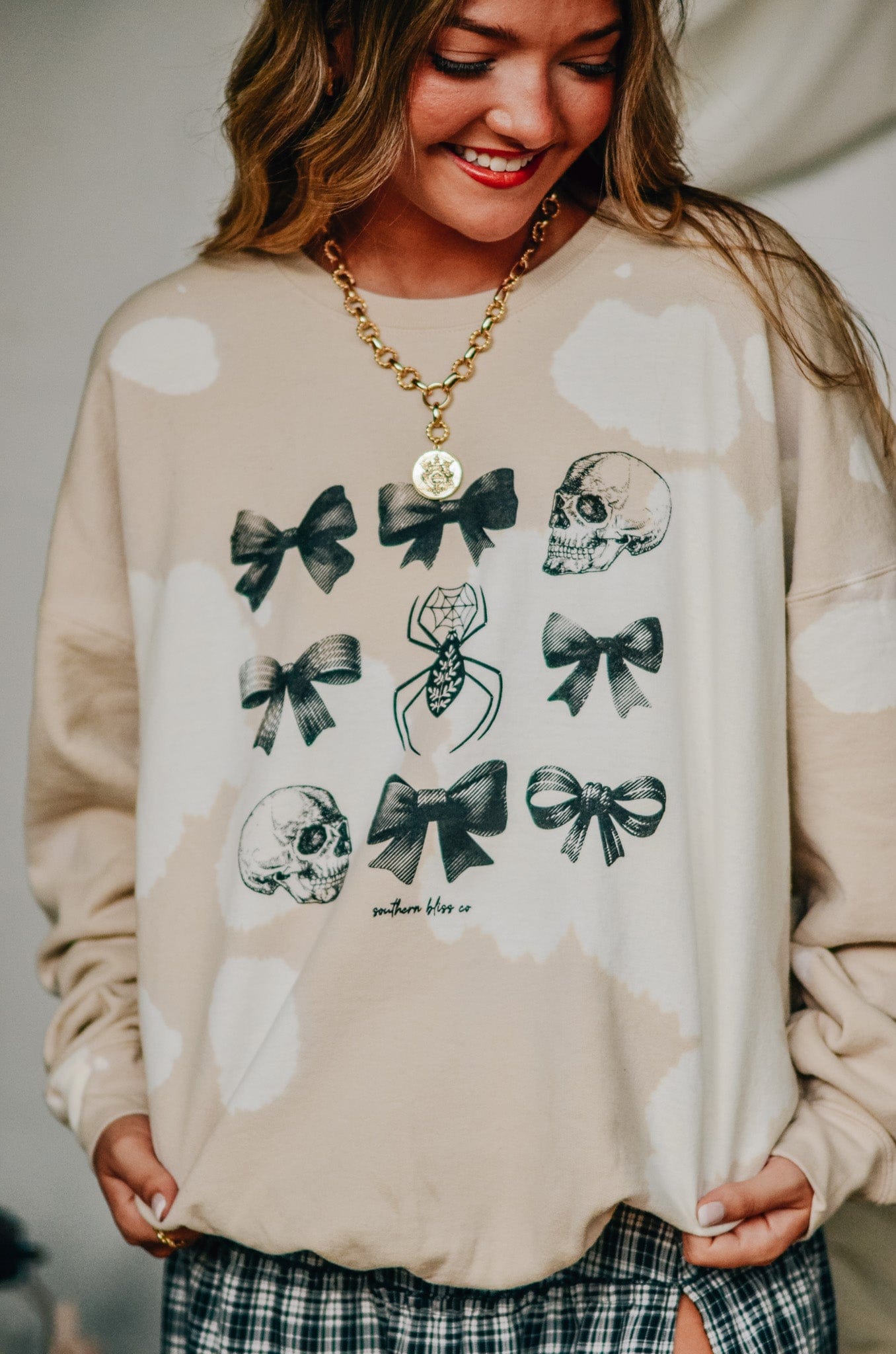 Bows and Skulls Bomba Sweatshirt-Dear Me Southern Boutique, located in DeRidder, Louisiana