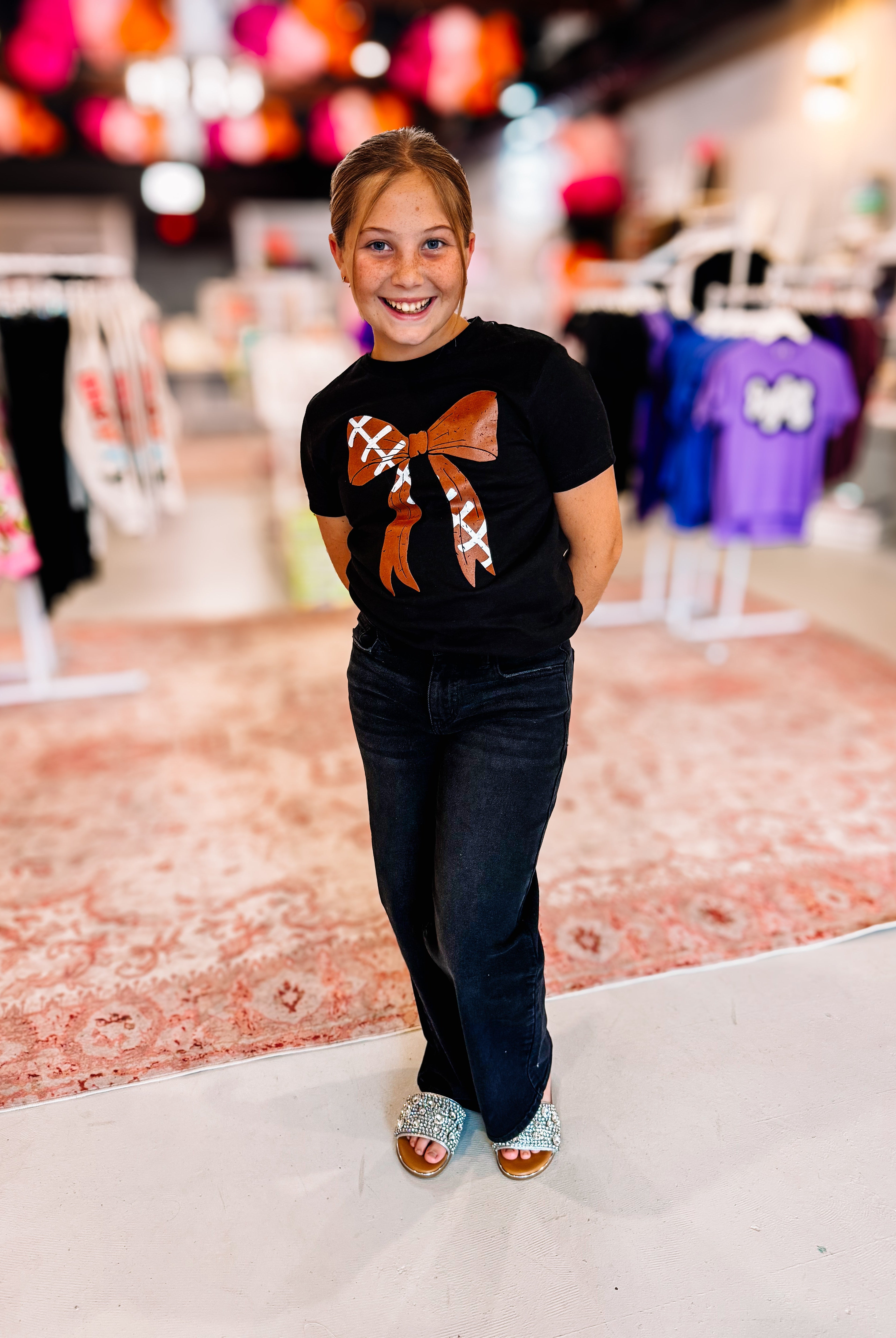 Football Bow Tee -Girls-JAG Graphic Tops-Dear Me Southern Boutique, located in DeRidder, Louisiana