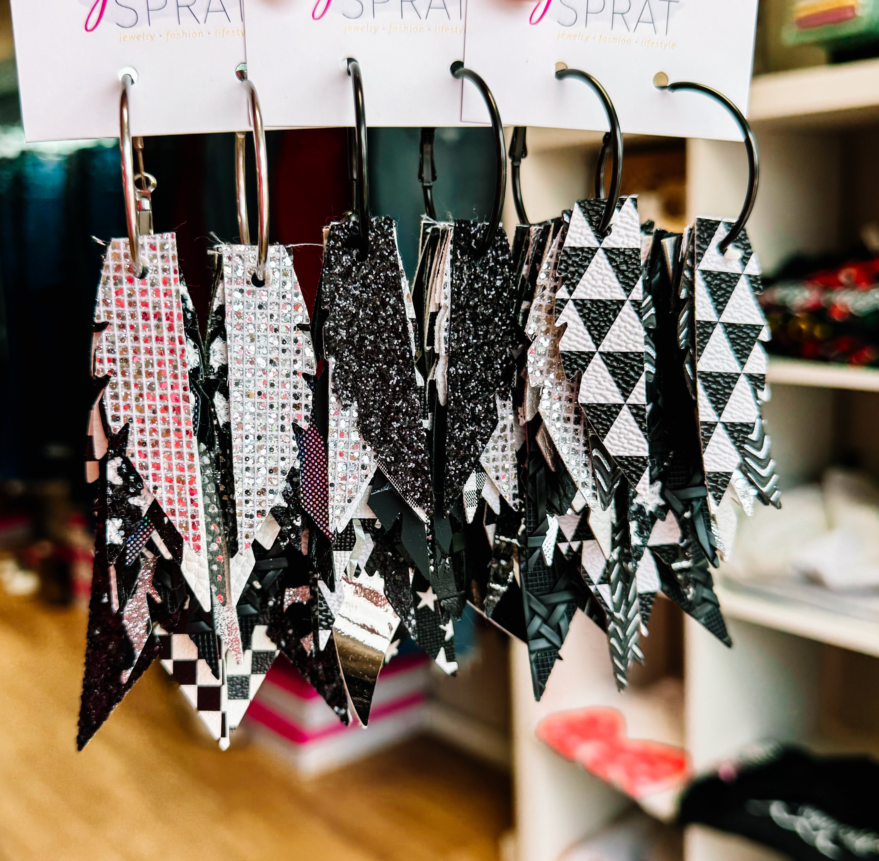 Jak Sprat Black, White, & Checkered Collection: Fabulous Feather Dangles-Earrings-Dear Me Southern Boutique, located in DeRidder, Louisiana