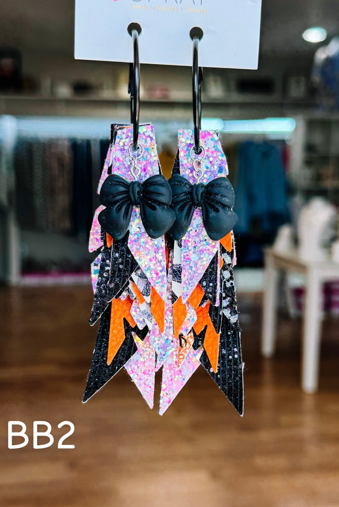 Jak Sprat Boos & Bows Collection: Charmed Fabulous Feather Dangles-Earrings-Dear Me Southern Boutique, located in DeRidder, Louisiana