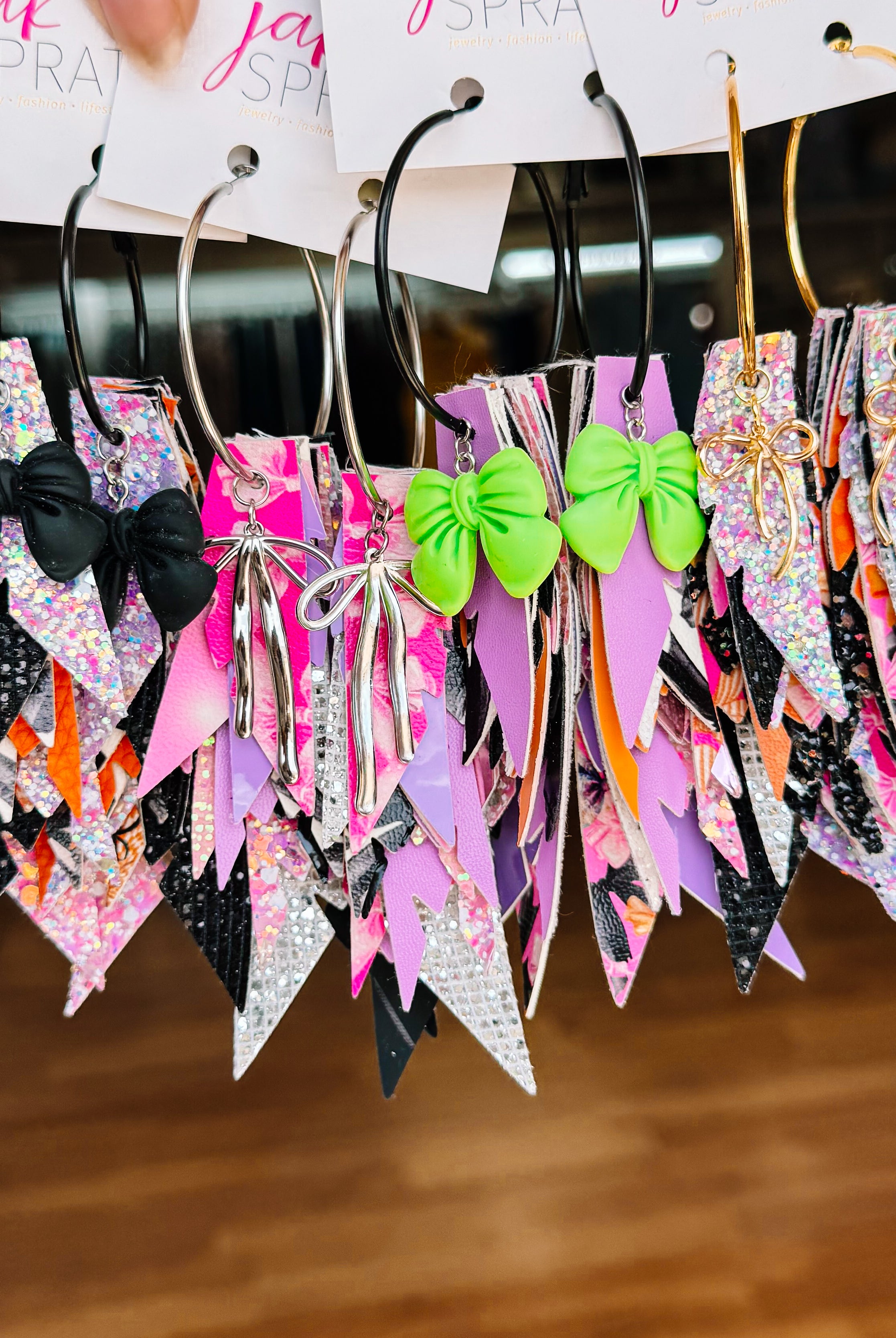 Jak Sprat Boos & Bows Collection: Charmed Fabulous Feather Dangles-Earrings-Dear Me Southern Boutique, located in DeRidder, Louisiana