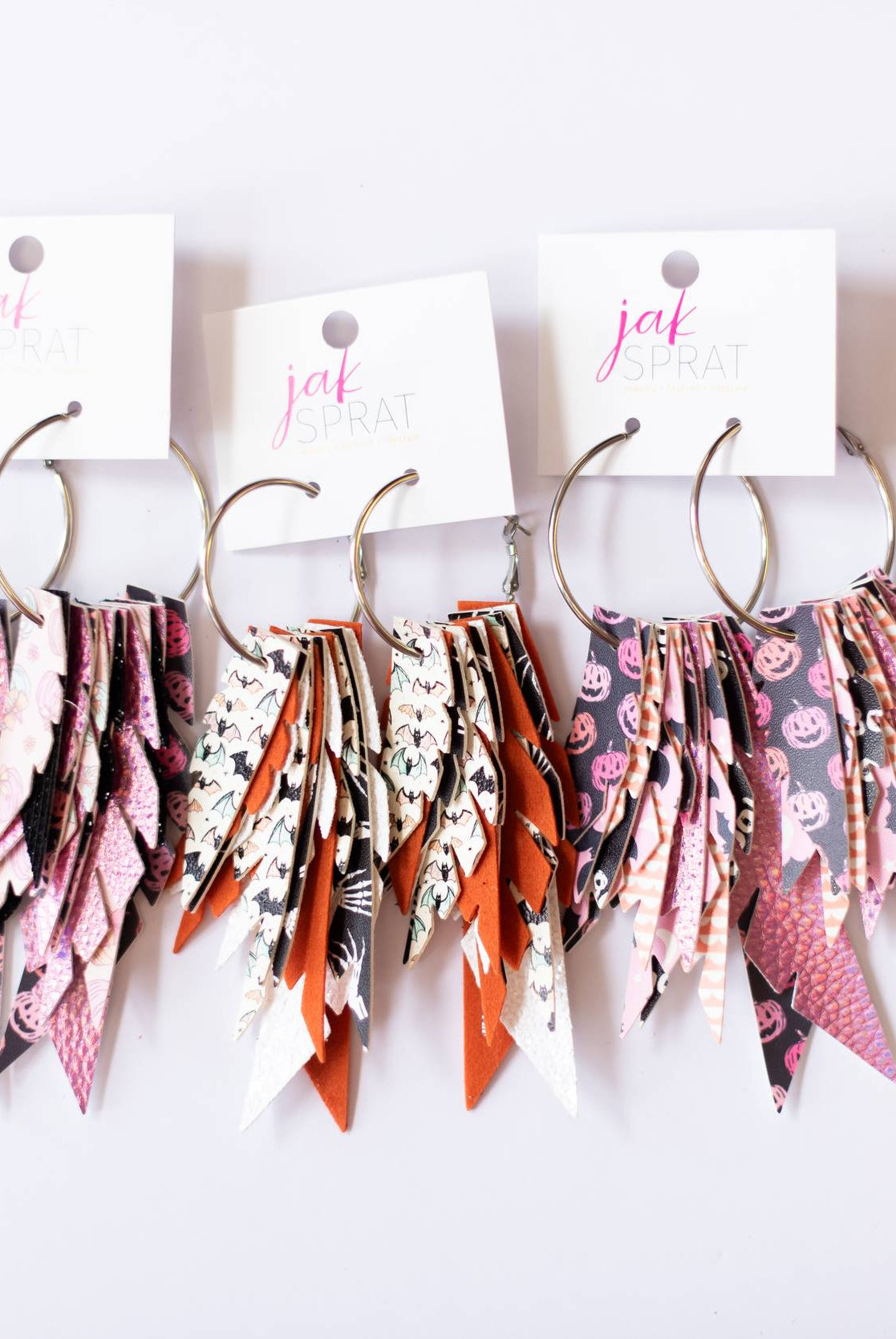 Jak Sprat Glitter & Ghouls Collection: Fabulous Feather Dangles-Earrings-Dear Me Southern Boutique, located in DeRidder, Louisiana