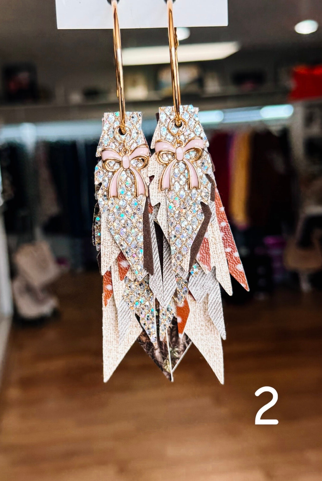 Jak Sprat Oh Deer, She's Cute Collection: Charmed Fabulous Feather Dangles-Jewelry - Earrings-Dear Me Southern Boutique, located in DeRidder, Louisiana
