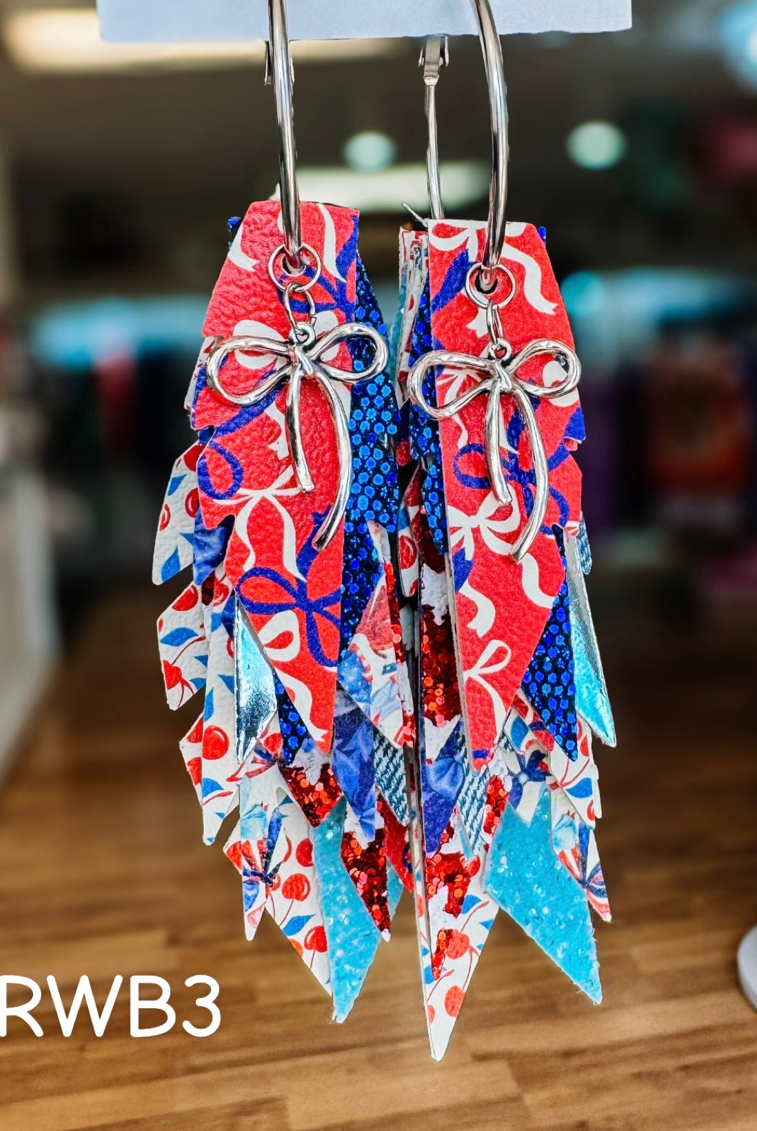 Jak Sprat Red, White, & Bows Collection: Charmed Fabulous Feather Dangles-Earrings-Dear Me Southern Boutique, located in DeRidder, Louisiana