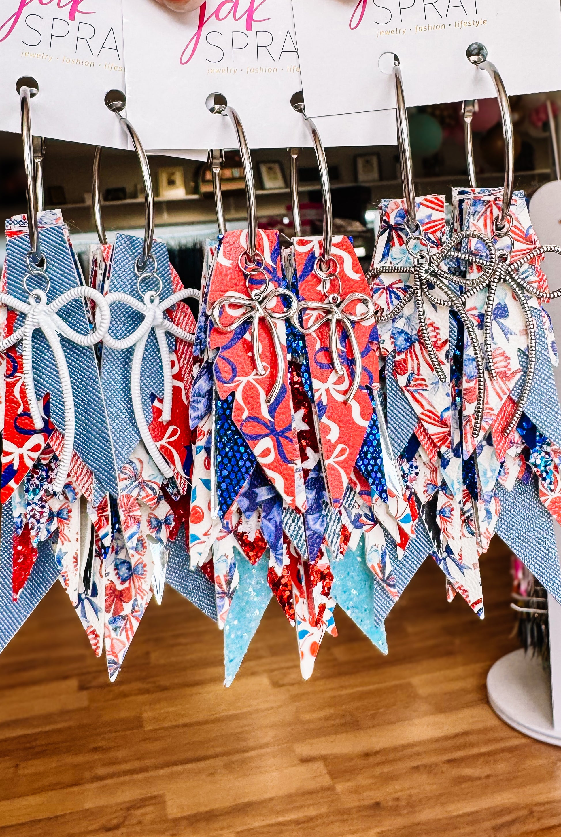 Jak Sprat Red, White, & Bows Collection: Charmed Fabulous Feather Dangles-Earrings-Dear Me Southern Boutique, located in DeRidder, Louisiana