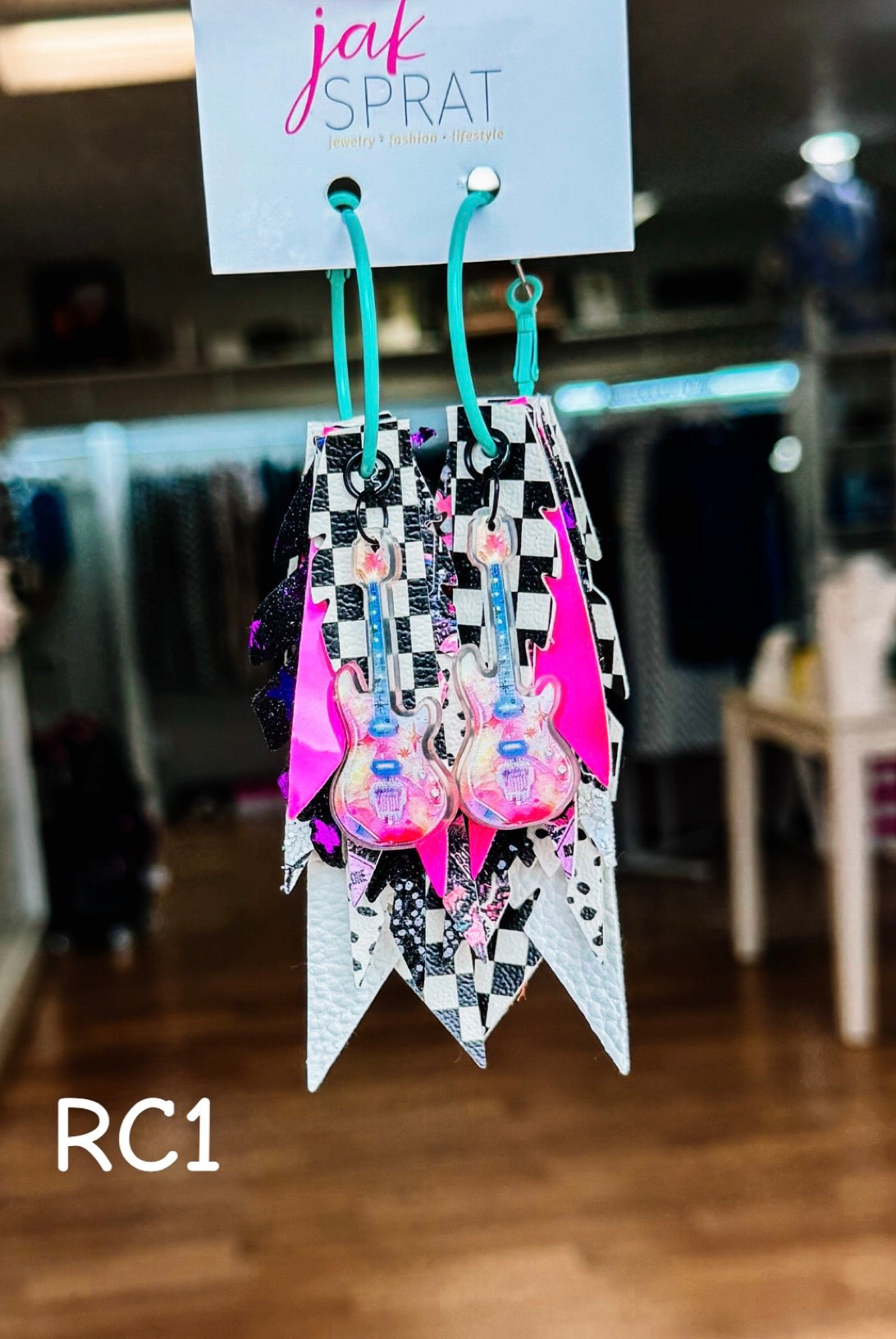 Jak Sprat Rocker Collection: Charmed Fabulous Feather Dangles-Earrings-Dear Me Southern Boutique, located in DeRidder, Louisiana