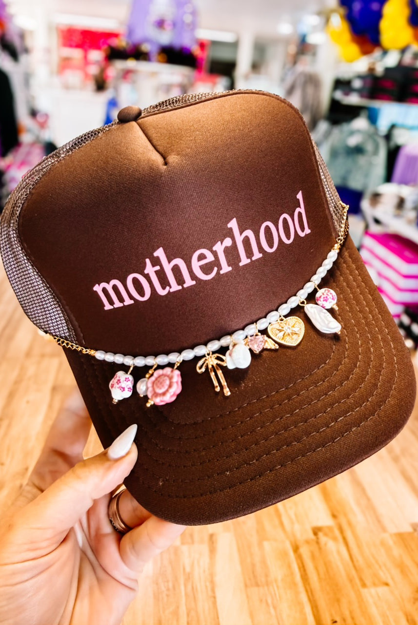 Motherhood Era Trucker Hat-hat-Dear Me Southern Boutique, located in DeRidder, Louisiana