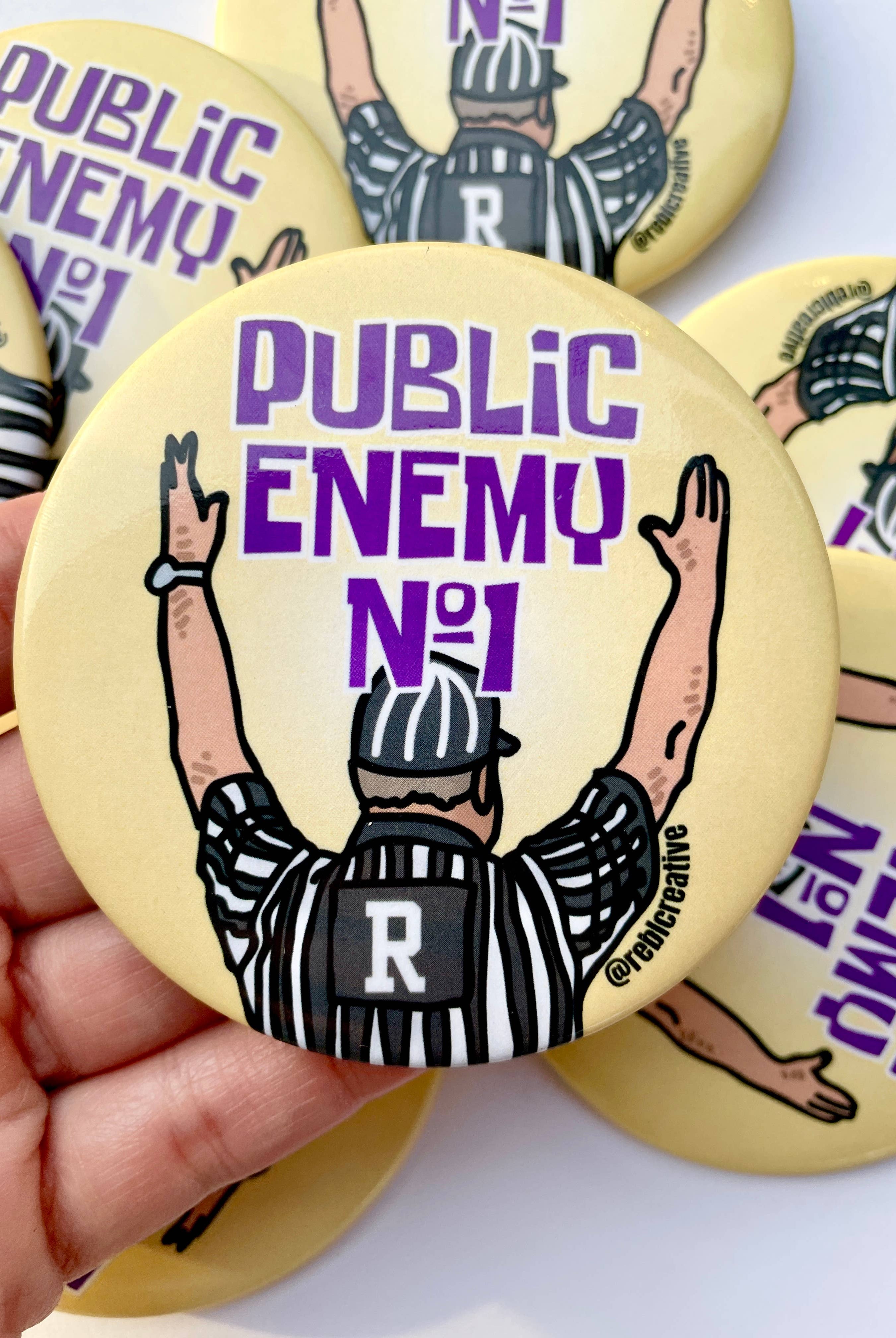 Public Enemy No. 1 - Purple & Yellow - Game Day Button-Dear Me Southern Boutique, located in DeRidder, Louisiana