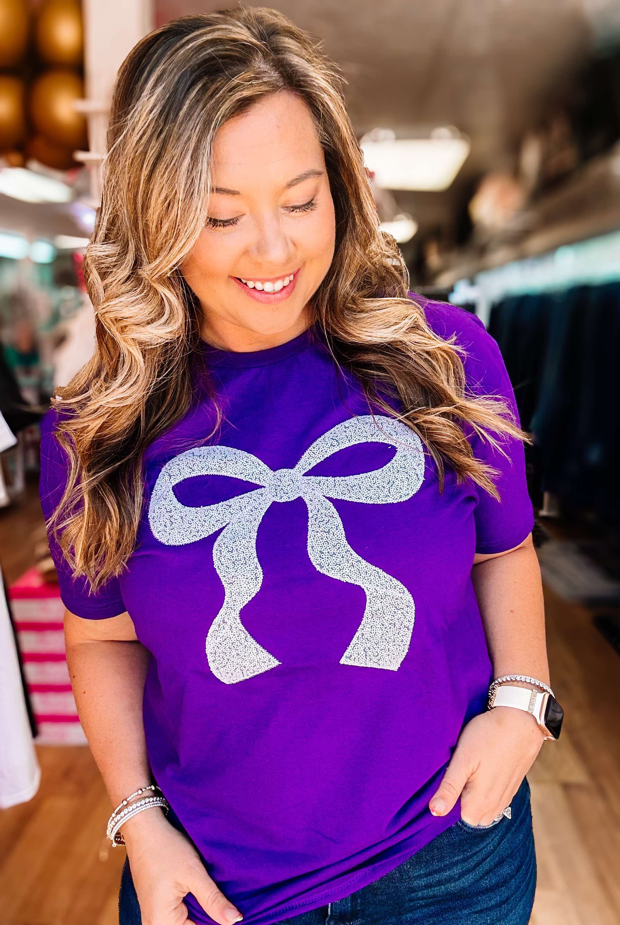 Put A Bow On It Sequin Tee - Purple-Graphic Tops-Dear Me Southern Boutique, located in DeRidder, Louisiana