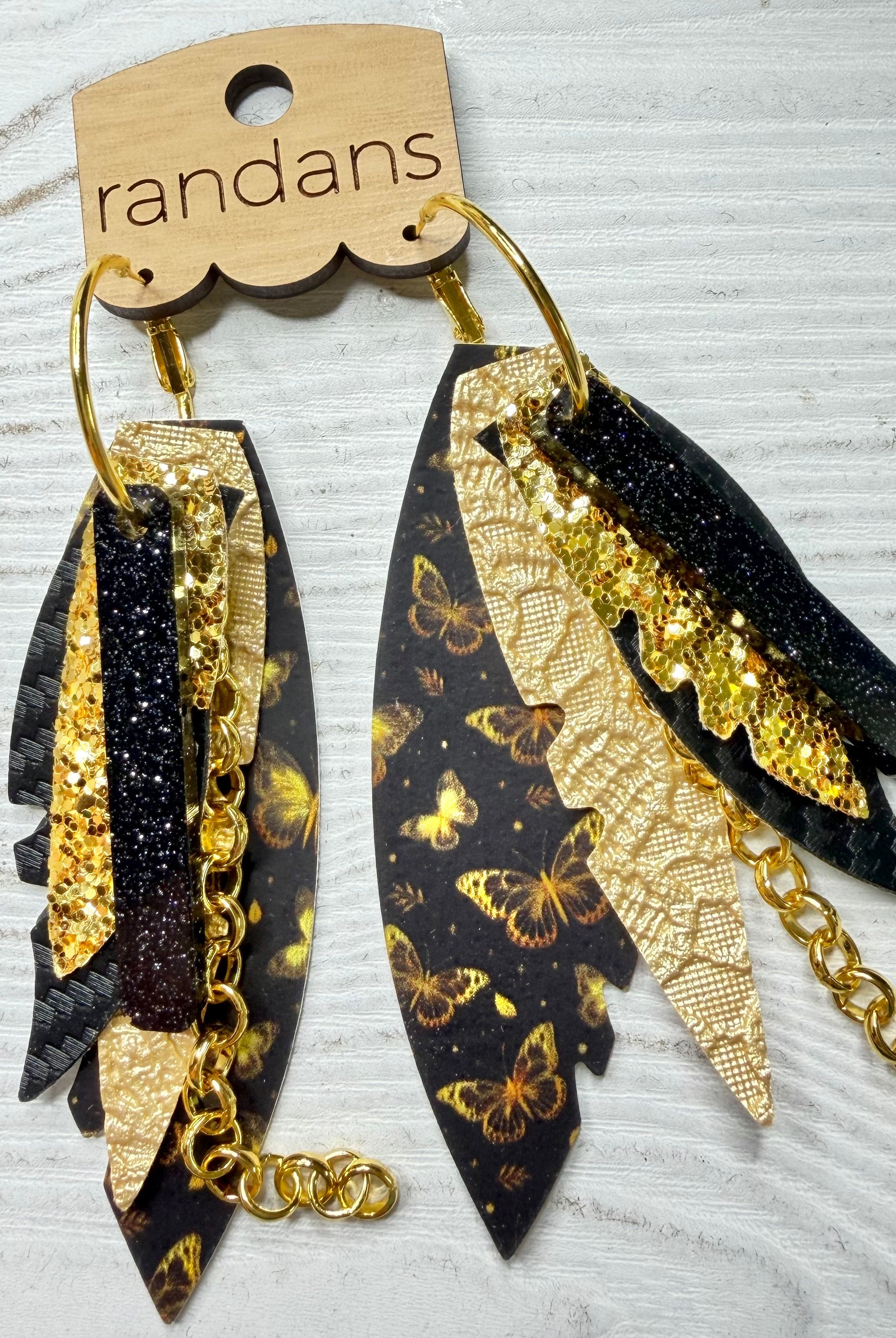 Randans fringe hoop earrings- butterflies- black gold-Dear Me Southern Boutique, located in DeRidder, Louisiana