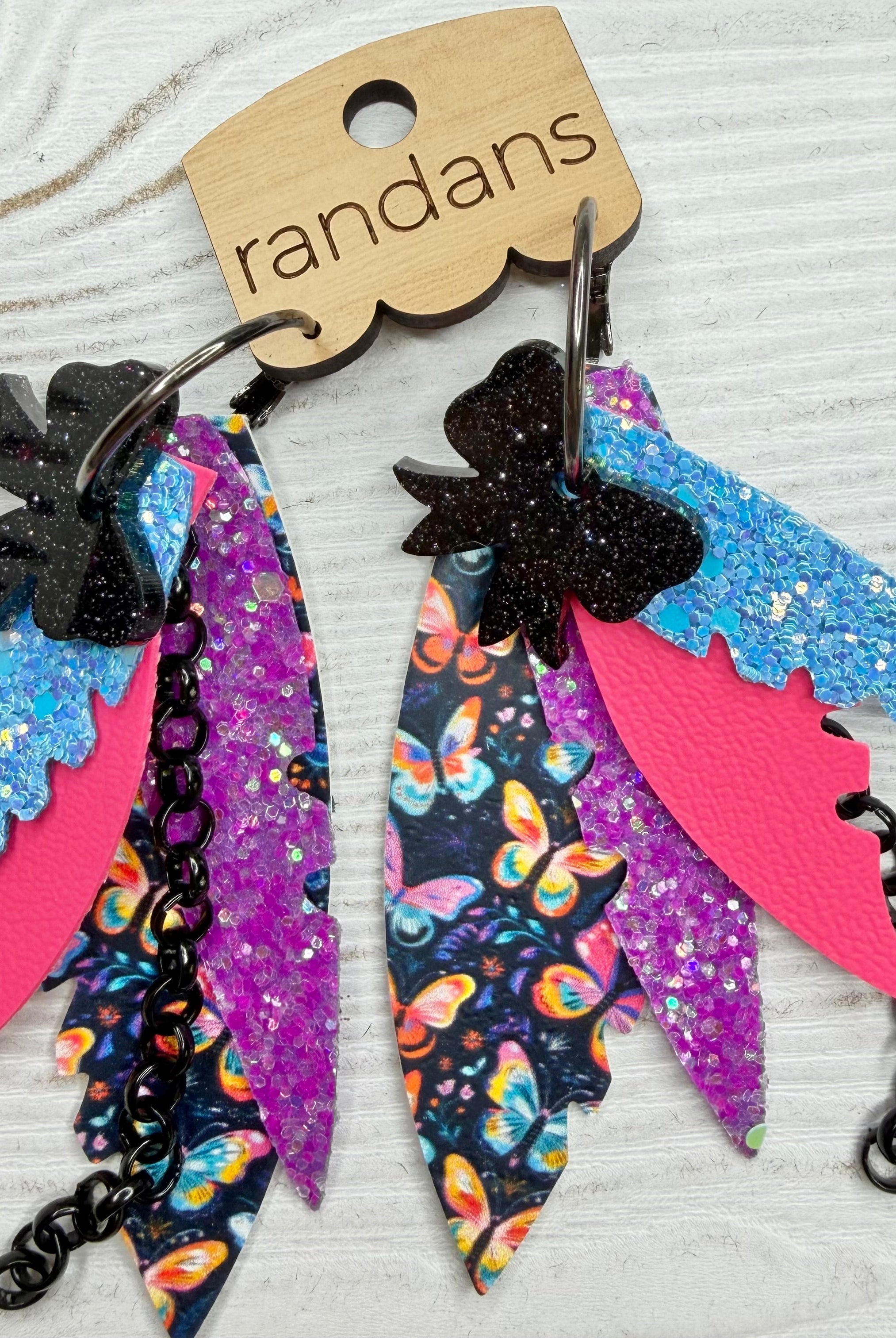 Randans fringe hoop earrings- butterflies- black rainbow-Dear Me Southern Boutique, located in DeRidder, Louisiana