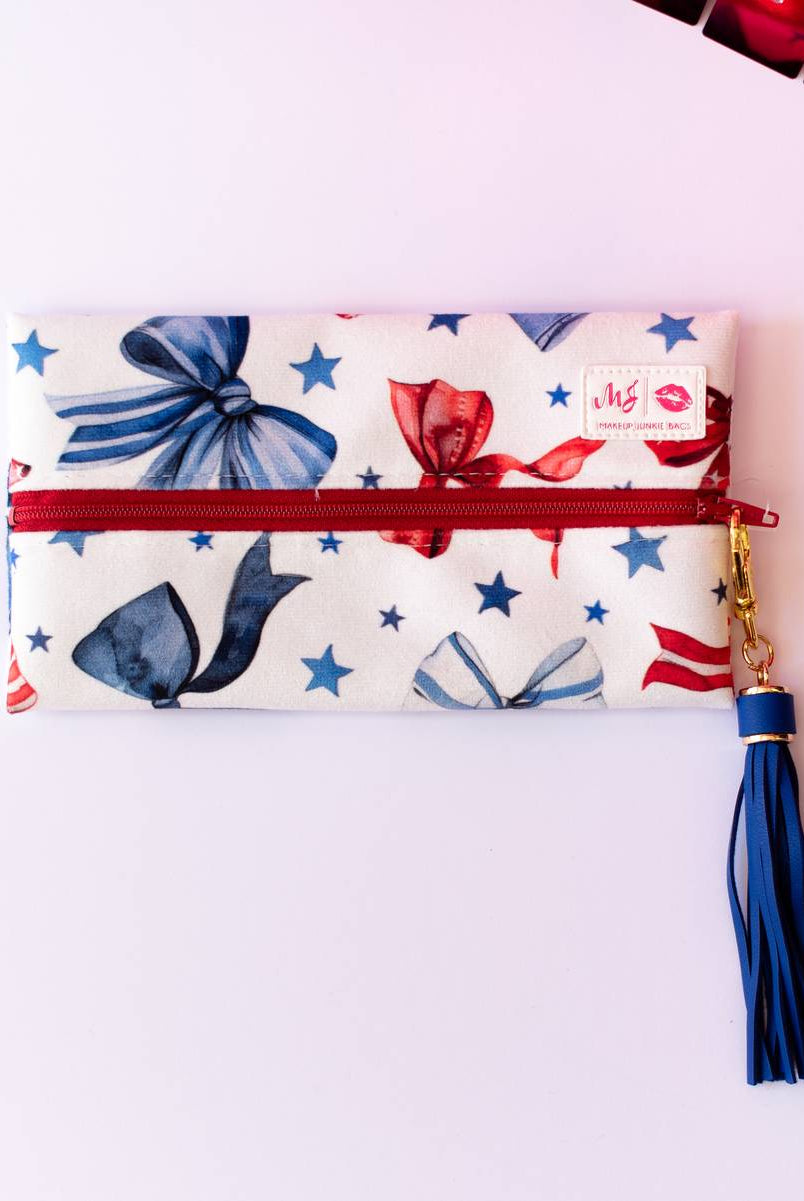 Red, White, & Bow Makeup Junkie Pouches-Makeup Bags-Dear Me Southern Boutique, located in DeRidder, Louisiana