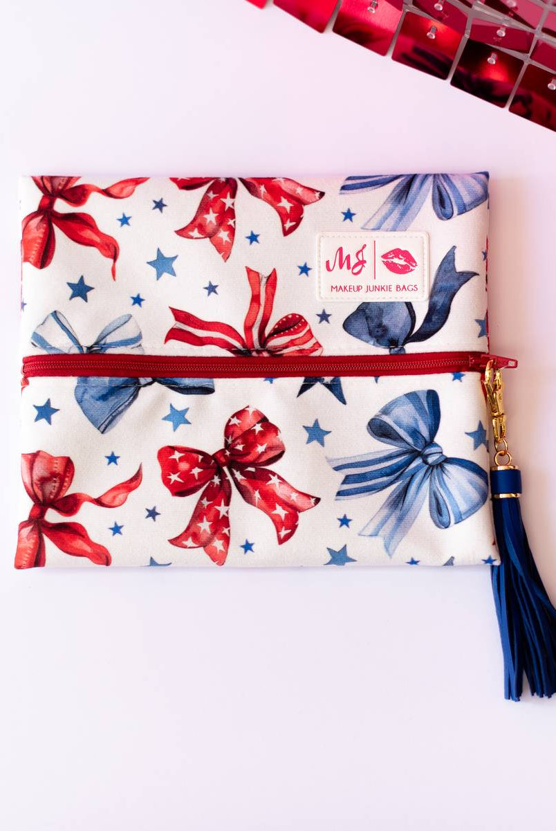 Red, White, & Bow Makeup Junkie Pouches-Makeup Bags-Dear Me Southern Boutique, located in DeRidder, Louisiana