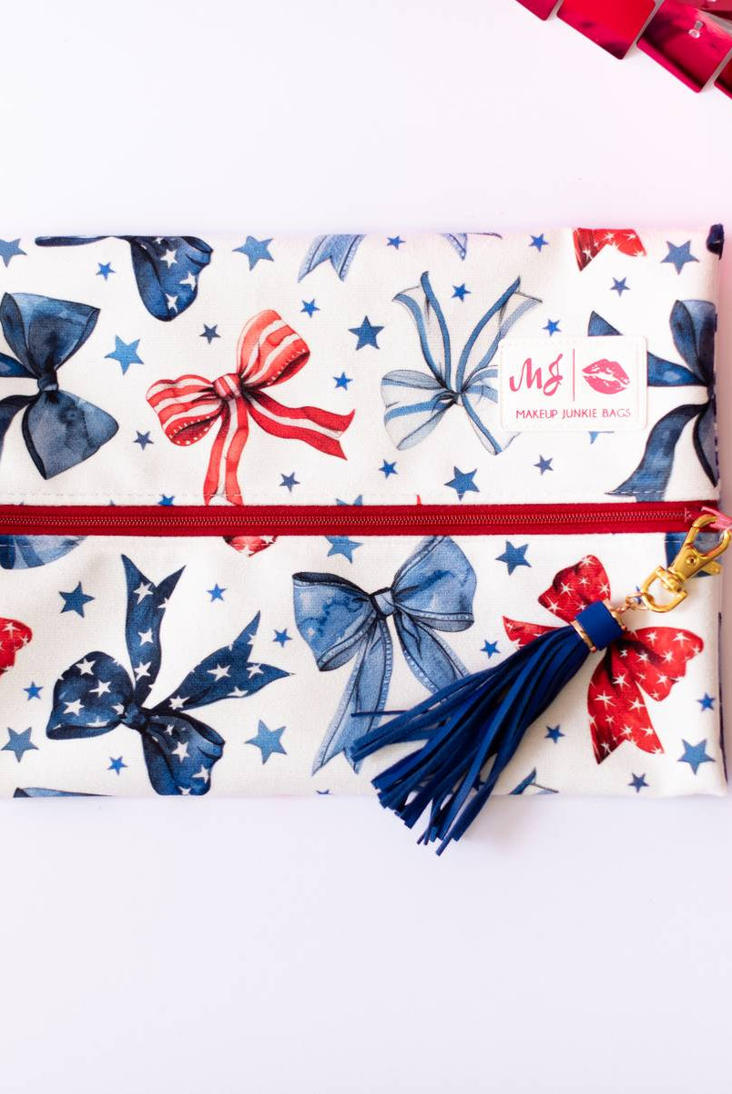 Red, White, & Bow Makeup Junkie Pouches-Makeup Bags-Dear Me Southern Boutique, located in DeRidder, Louisiana