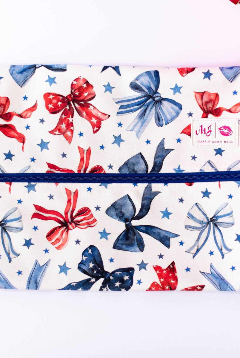 Red, White, & Bow Makeup Junkie Pouches-Makeup Bags-Dear Me Southern Boutique, located in DeRidder, Louisiana