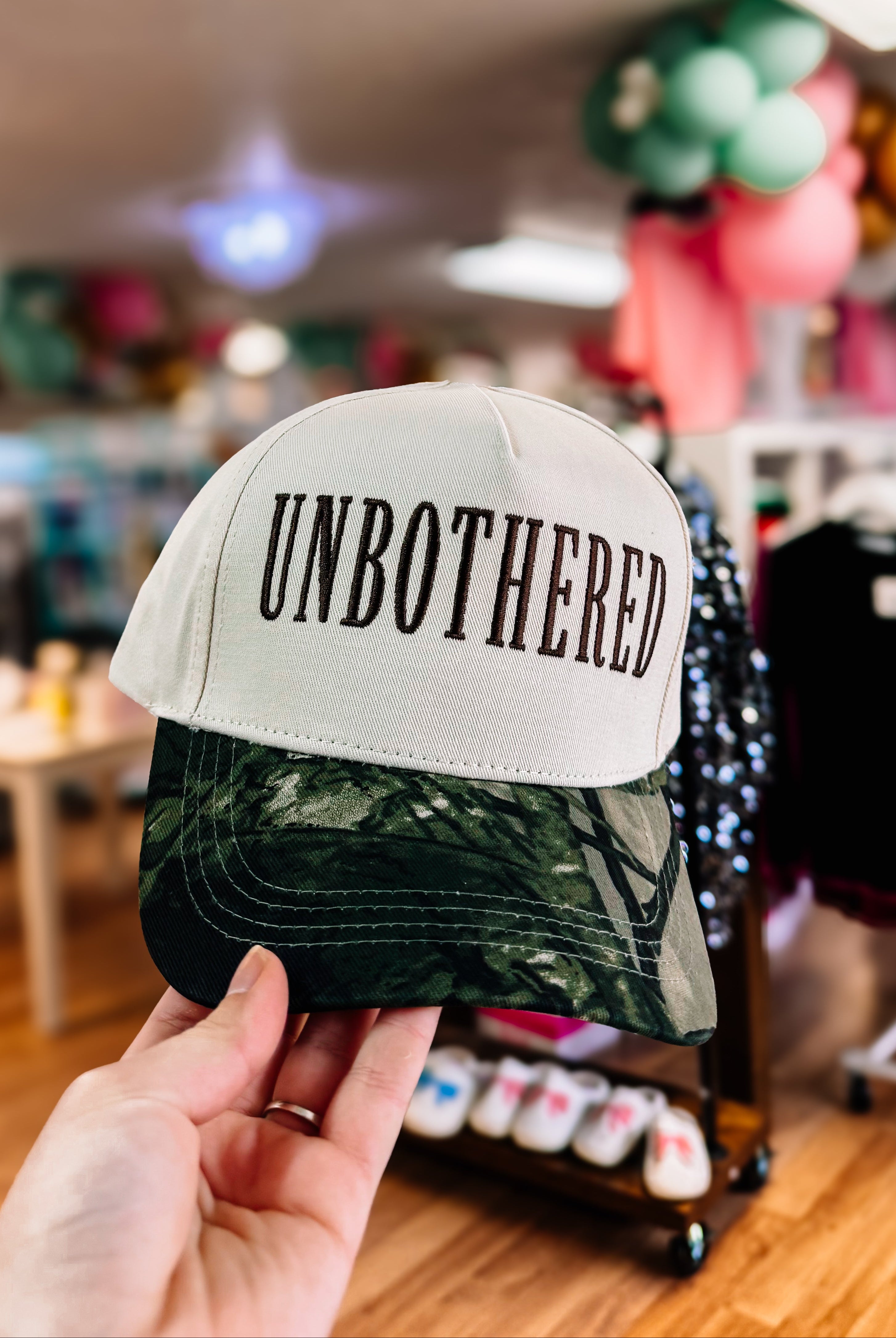 Unbothered Camo Trucker Hat-Trucker Hats-Dear Me Southern Boutique, located in DeRidder, Louisiana