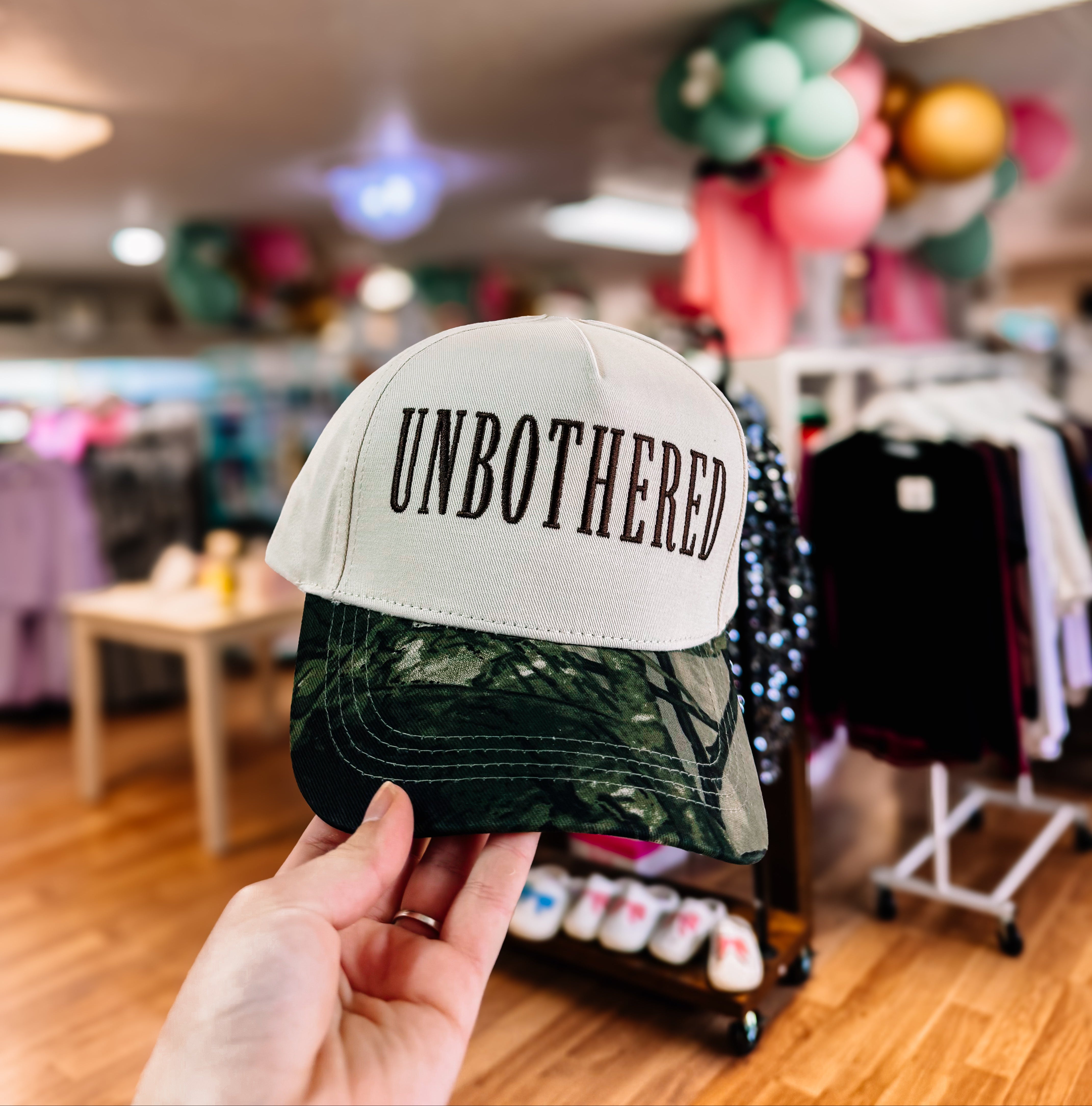Unbothered Camo Trucker Hat-Trucker Hats-Dear Me Southern Boutique, located in DeRidder, Louisiana