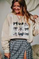 Bows and Skulls Bomba Sweatshirt-Dear Me Southern Boutique, located in DeRidder, Louisiana