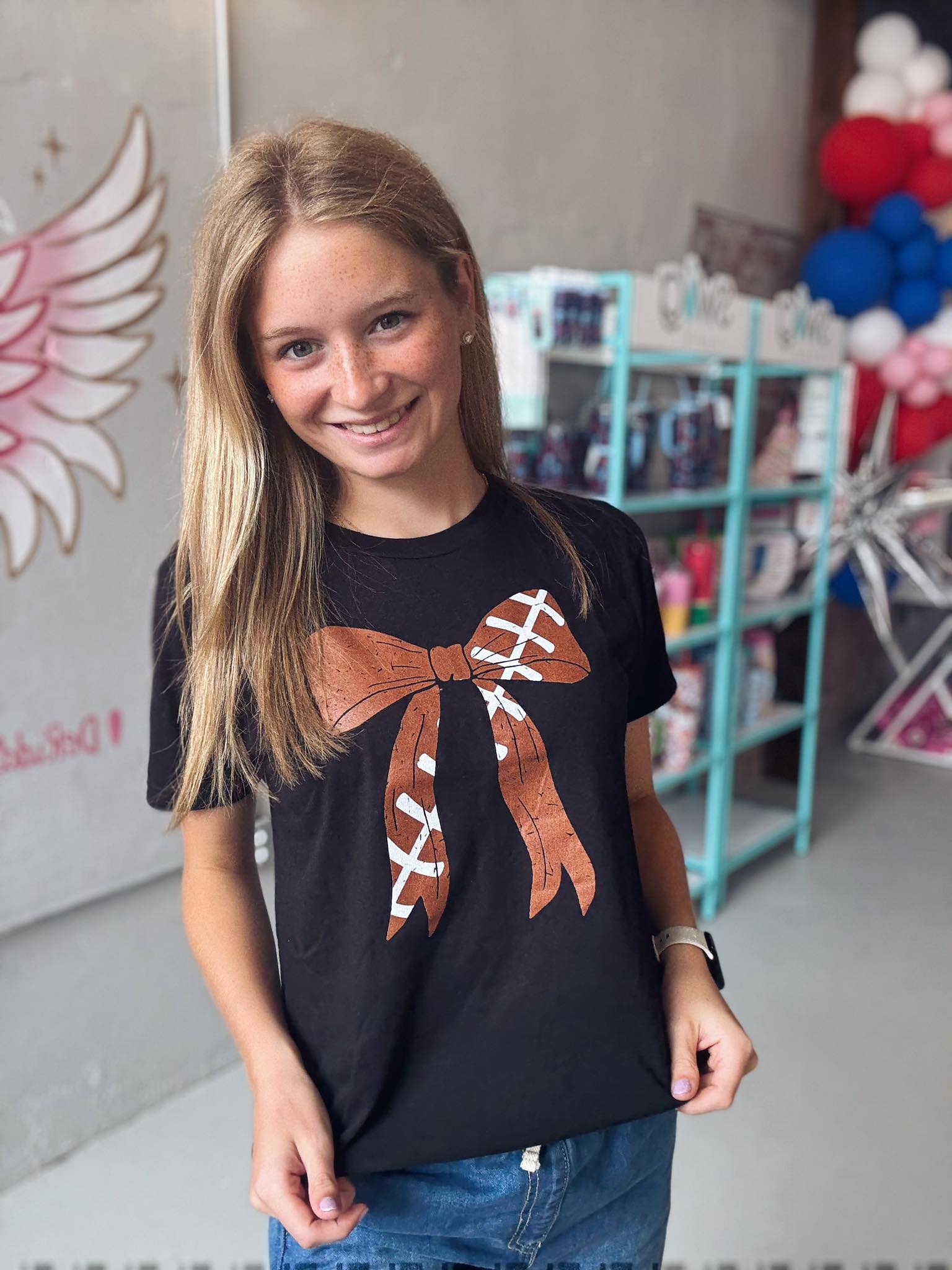 Football Bow Tee -Girls-Kids Clothing-Dear Me Southern Boutique, located in DeRidder, Louisiana