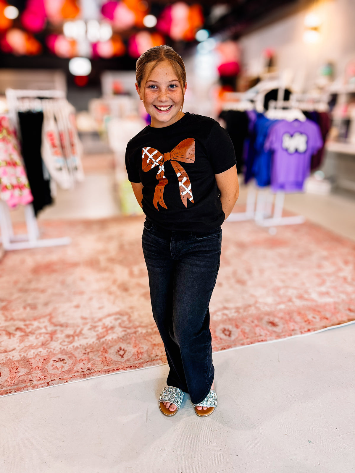 Football Bow Tee -Girls-Kids Clothing-Dear Me Southern Boutique, located in DeRidder, Louisiana