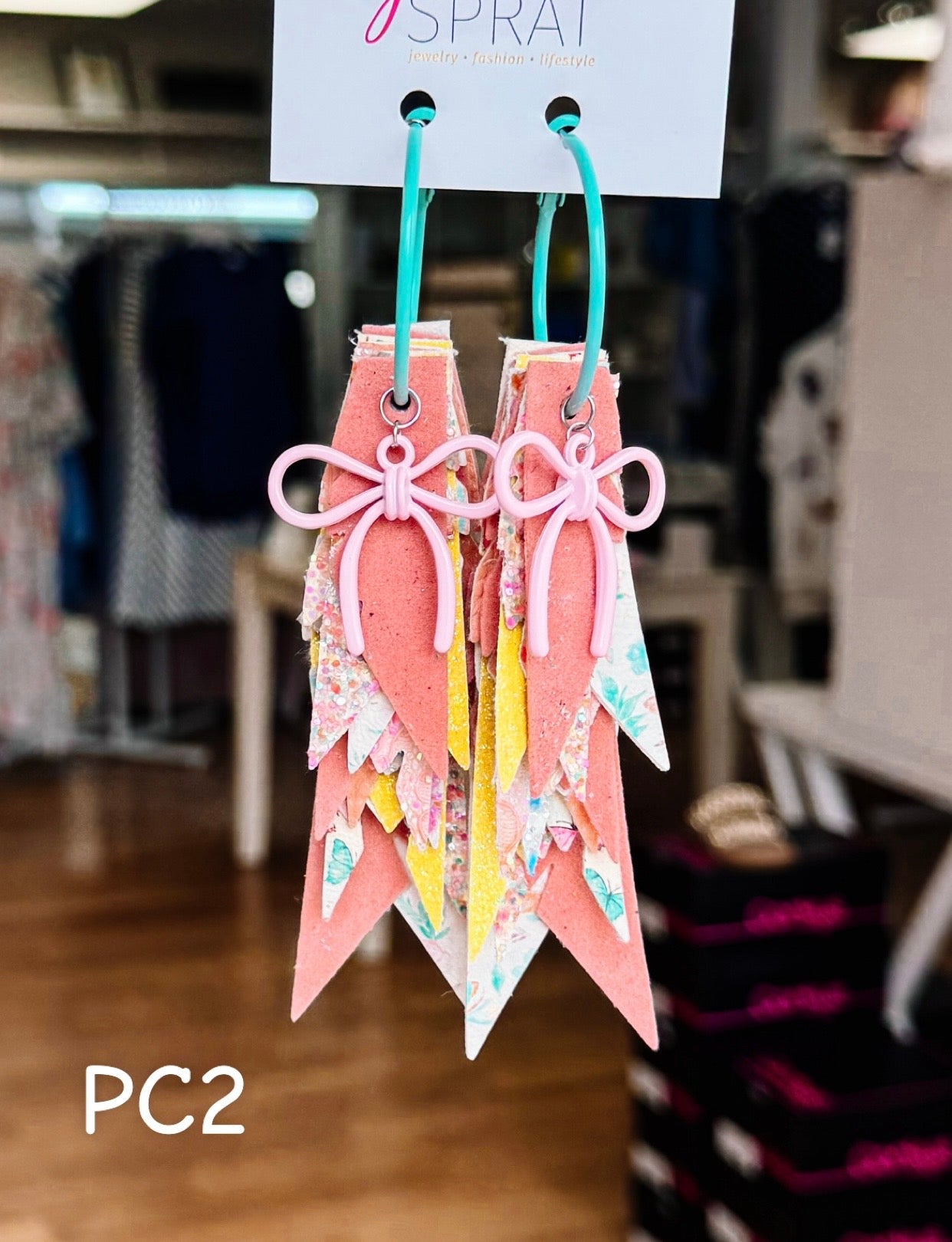 Jak Sprat Beg Your Parton Collection: Charmed Fabulous Feather Dangles-Jewelry - Earrings-Dear Me Southern Boutique, located in DeRidder, Louisiana