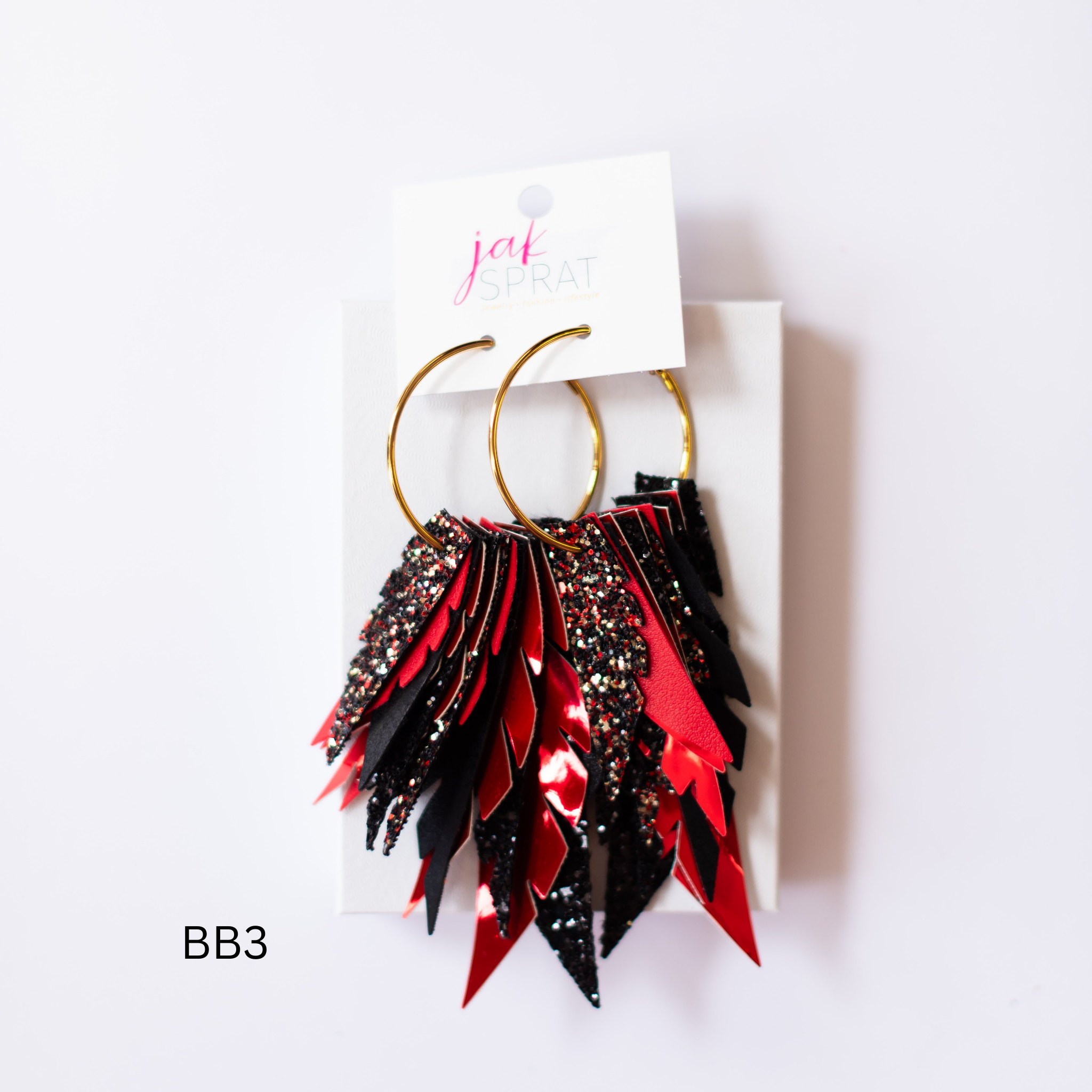 Jak Sprat Biker Babe Collection: Fabulous Feather Dangles-Earrings-Dear Me Southern Boutique, located in DeRidder, Louisiana