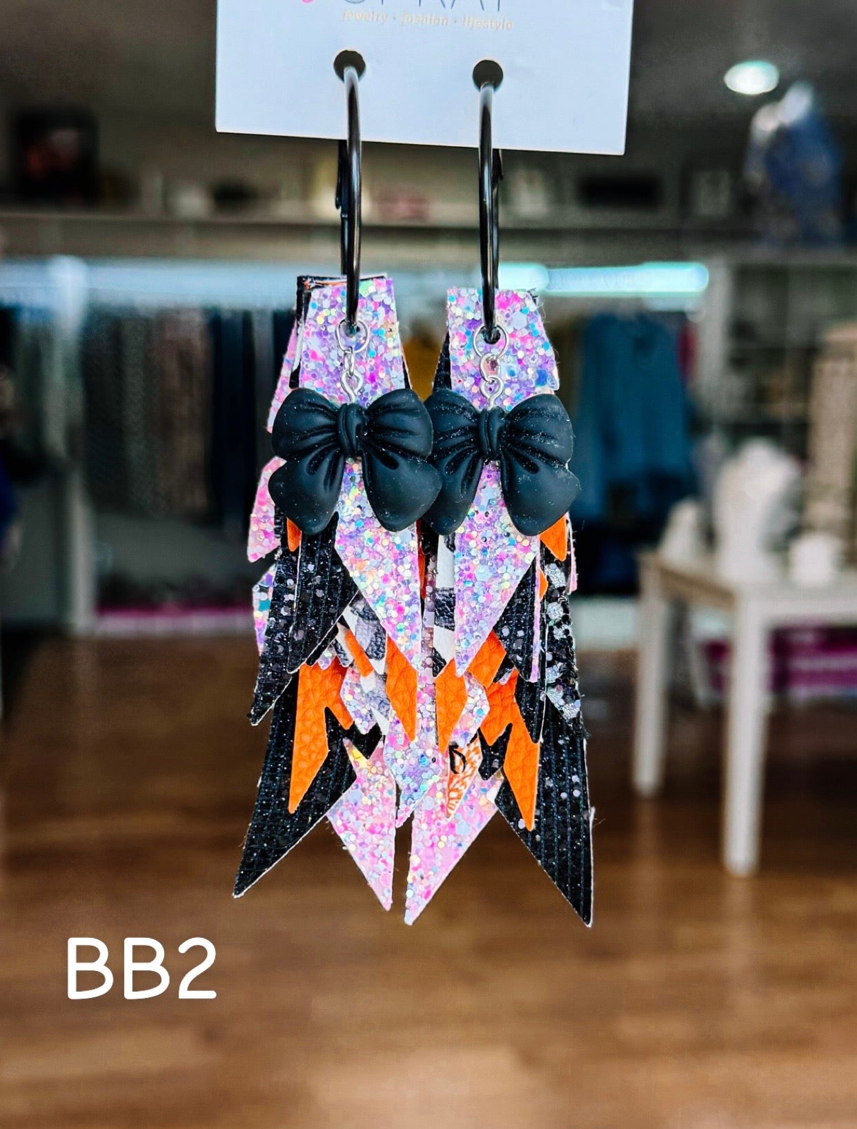Jak Sprat Boos & Bows Collection: Charmed Fabulous Feather Dangles-Earrings-Dear Me Southern Boutique, located in DeRidder, Louisiana
