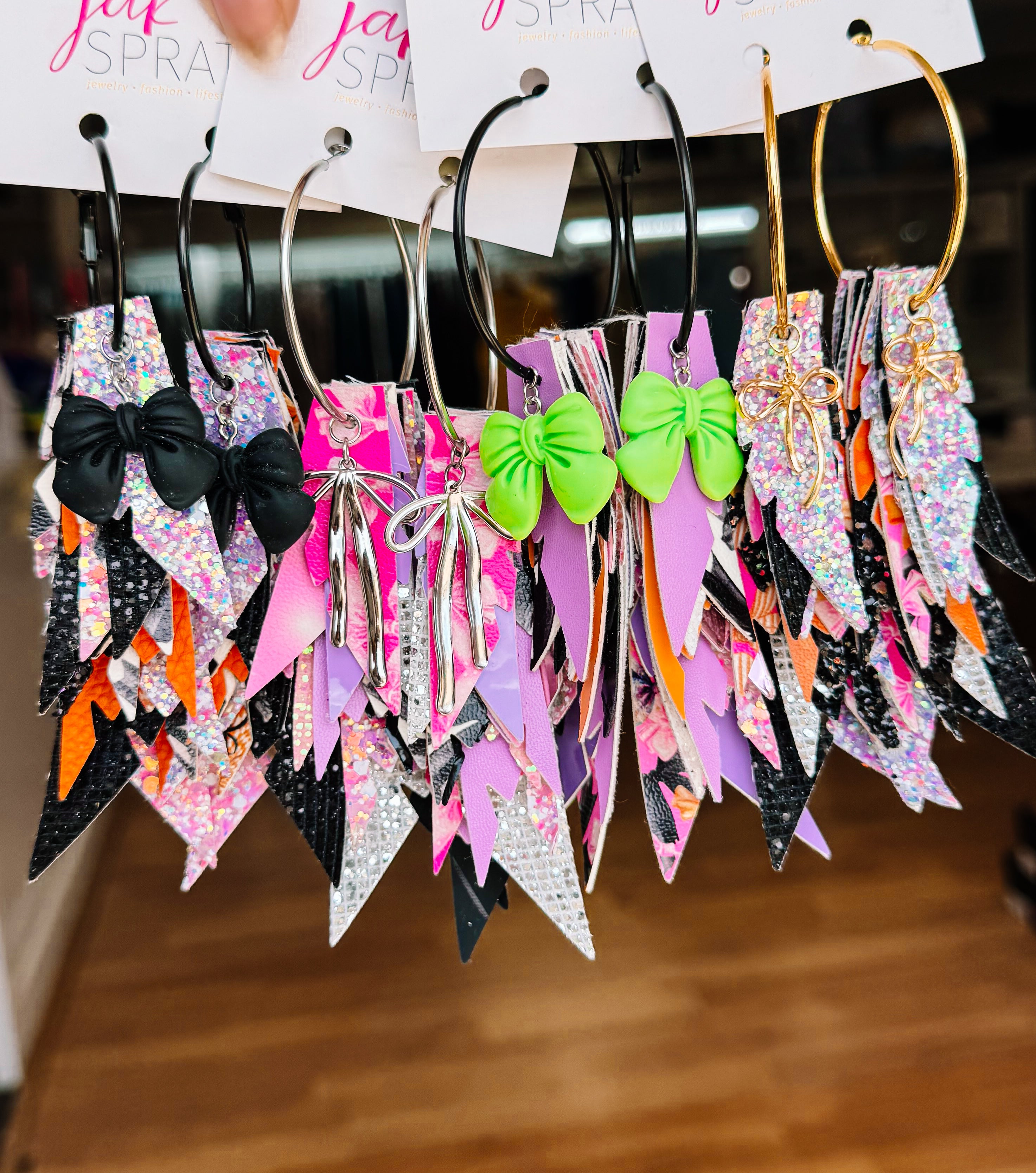 Jak Sprat Boos & Bows Collection: Charmed Fabulous Feather Dangles-Earrings-Dear Me Southern Boutique, located in DeRidder, Louisiana