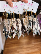 Jak Sprat Feral & Fabulous-Army Camo Collection: Charmed Fabulous Feather Dangles-Jewelry - Earrings-Dear Me Southern Boutique, located in DeRidder, Louisiana