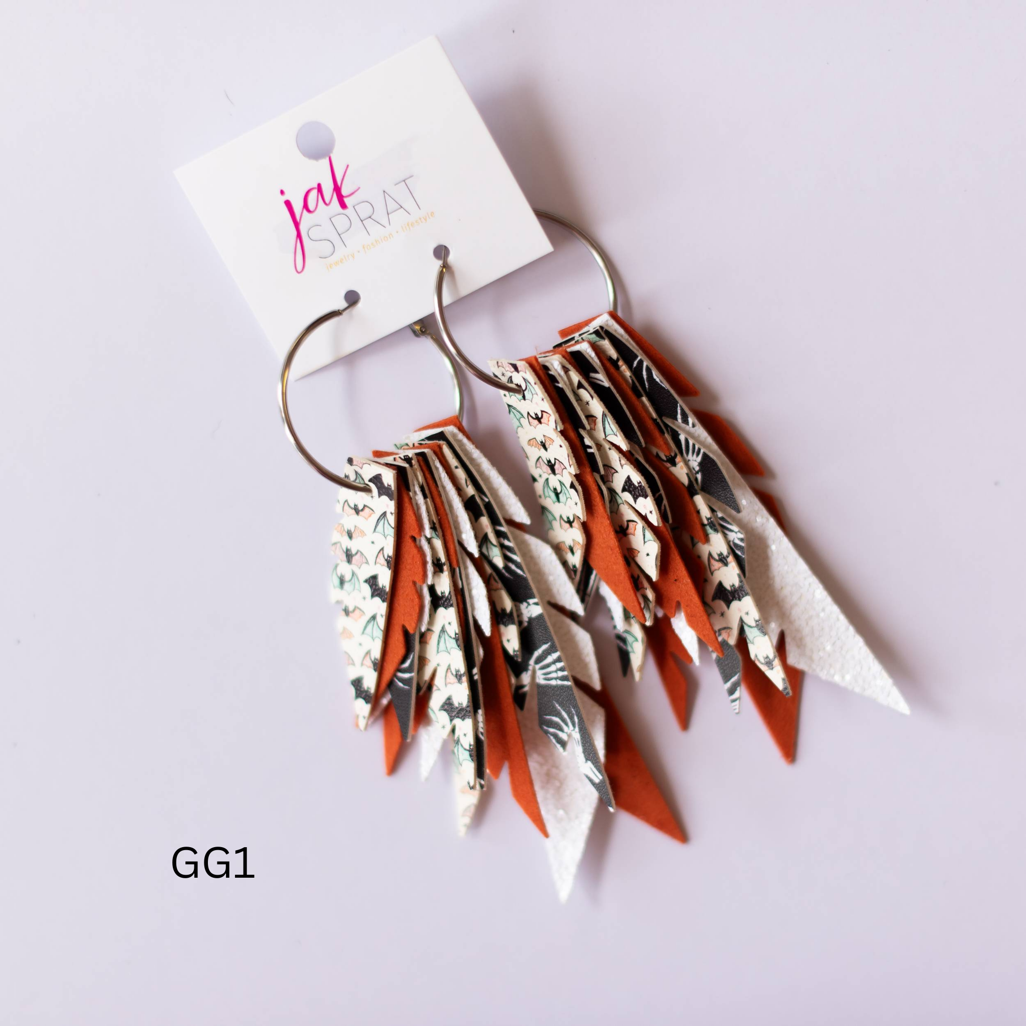 Jak Sprat Glitter & Ghouls Collection: Fabulous Feather Dangles-Earrings-Dear Me Southern Boutique, located in DeRidder, Louisiana