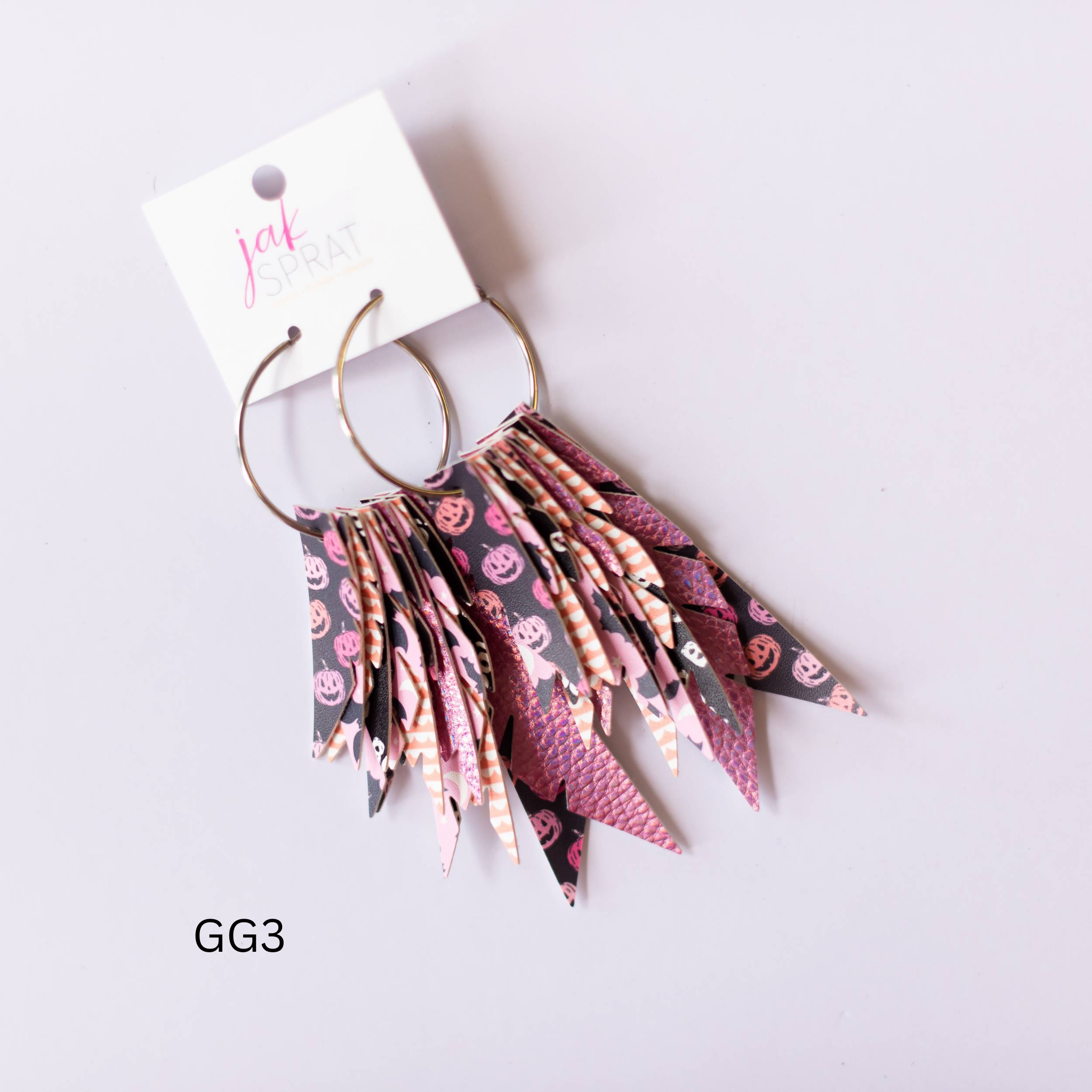 Jak Sprat Glitter & Ghouls Collection: Fabulous Feather Dangles-Earrings-Dear Me Southern Boutique, located in DeRidder, Louisiana