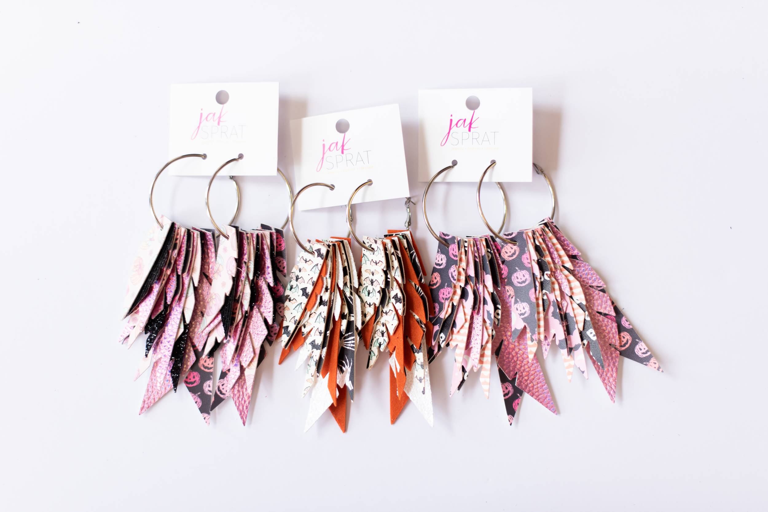Jak Sprat Glitter & Ghouls Collection: Fabulous Feather Dangles-Earrings-Dear Me Southern Boutique, located in DeRidder, Louisiana