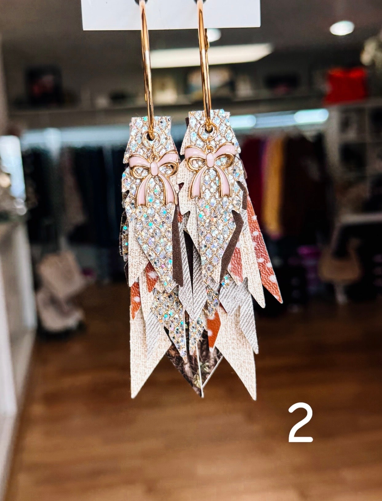 Jak Sprat Oh Deer, She's Cute Collection: Charmed Fabulous Feather Dangles-Jewelry - Earrings-Dear Me Southern Boutique, located in DeRidder, Louisiana