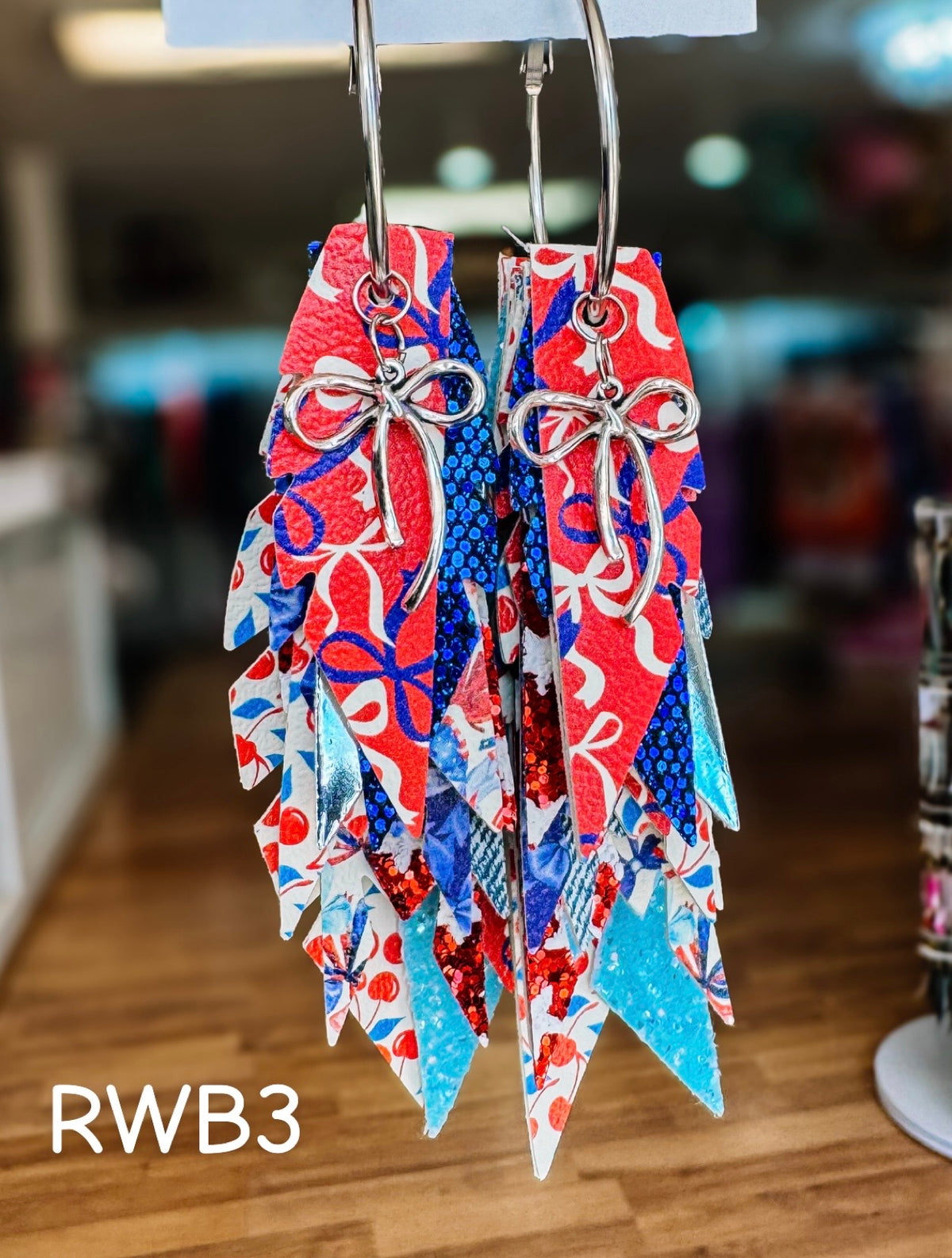 Jak Sprat Red, White, & Bows Collection: Charmed Fabulous Feather Dangles-Jewelry - Earrings-Dear Me Southern Boutique, located in DeRidder, Louisiana