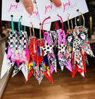 Jak Sprat Rocker Collection: Charmed Fabulous Feather Dangles-Jewelry - Earrings-Dear Me Southern Boutique, located in DeRidder, Louisiana