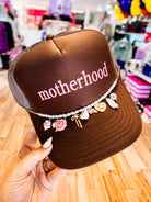 Motherhood Era Trucker Hat-hat-Dear Me Southern Boutique, located in DeRidder, Louisiana