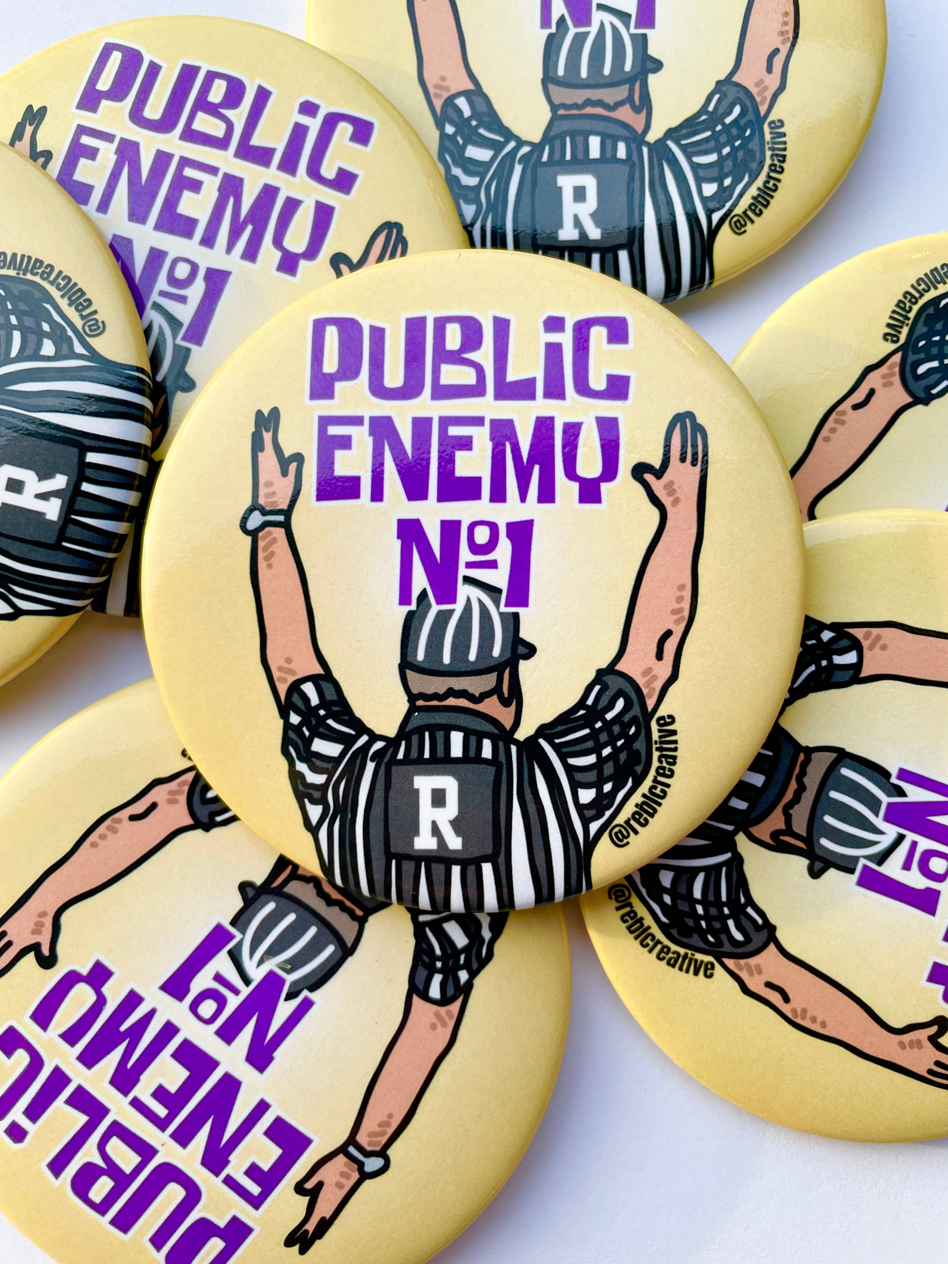Public Enemy No. 1 - Purple & Yellow - Game Day Button-Dear Me Southern Boutique, located in DeRidder, Louisiana
