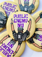Public Enemy No. 1 - Purple & Yellow - Game Day Button-Dear Me Southern Boutique, located in DeRidder, Louisiana