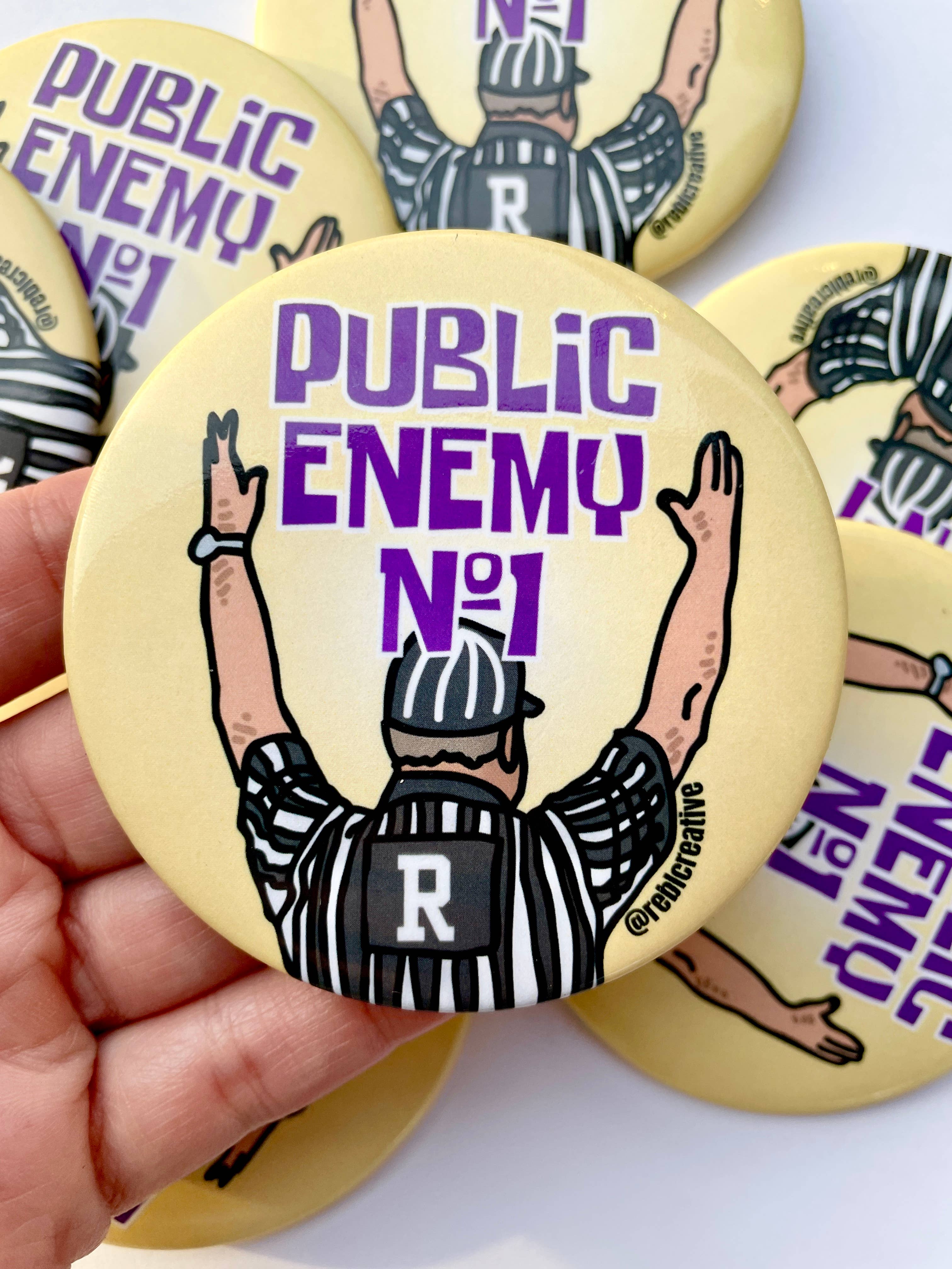 Public Enemy No. 1 - Purple & Yellow - Game Day Button-Dear Me Southern Boutique, located in DeRidder, Louisiana