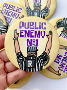 Public Enemy No. 1 - Purple & Yellow - Game Day Button-Dear Me Southern Boutique, located in DeRidder, Louisiana