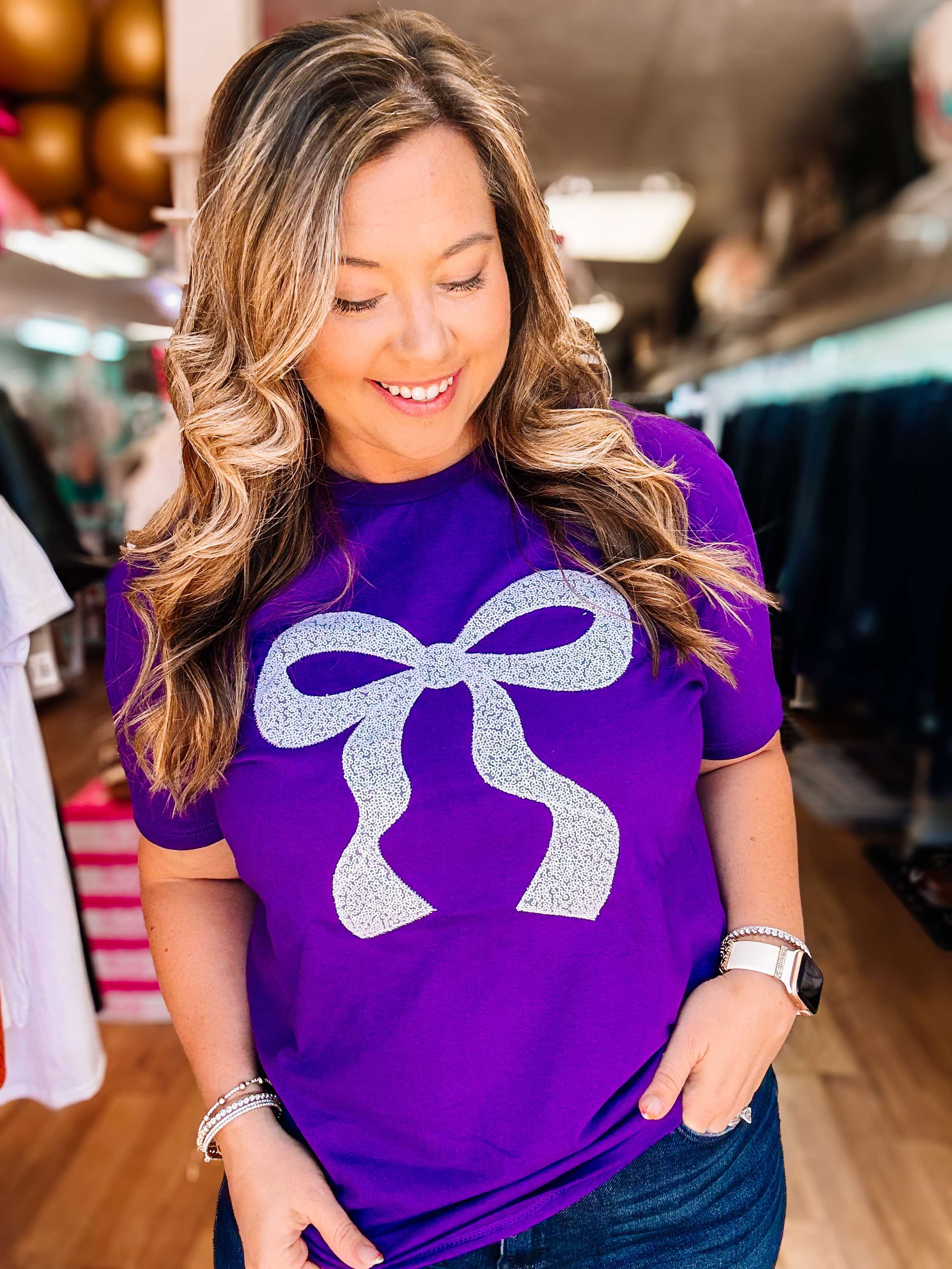 Put A Bow On It Sequin Tee - Purple-Graphic Tops-Dear Me Southern Boutique, located in DeRidder, Louisiana