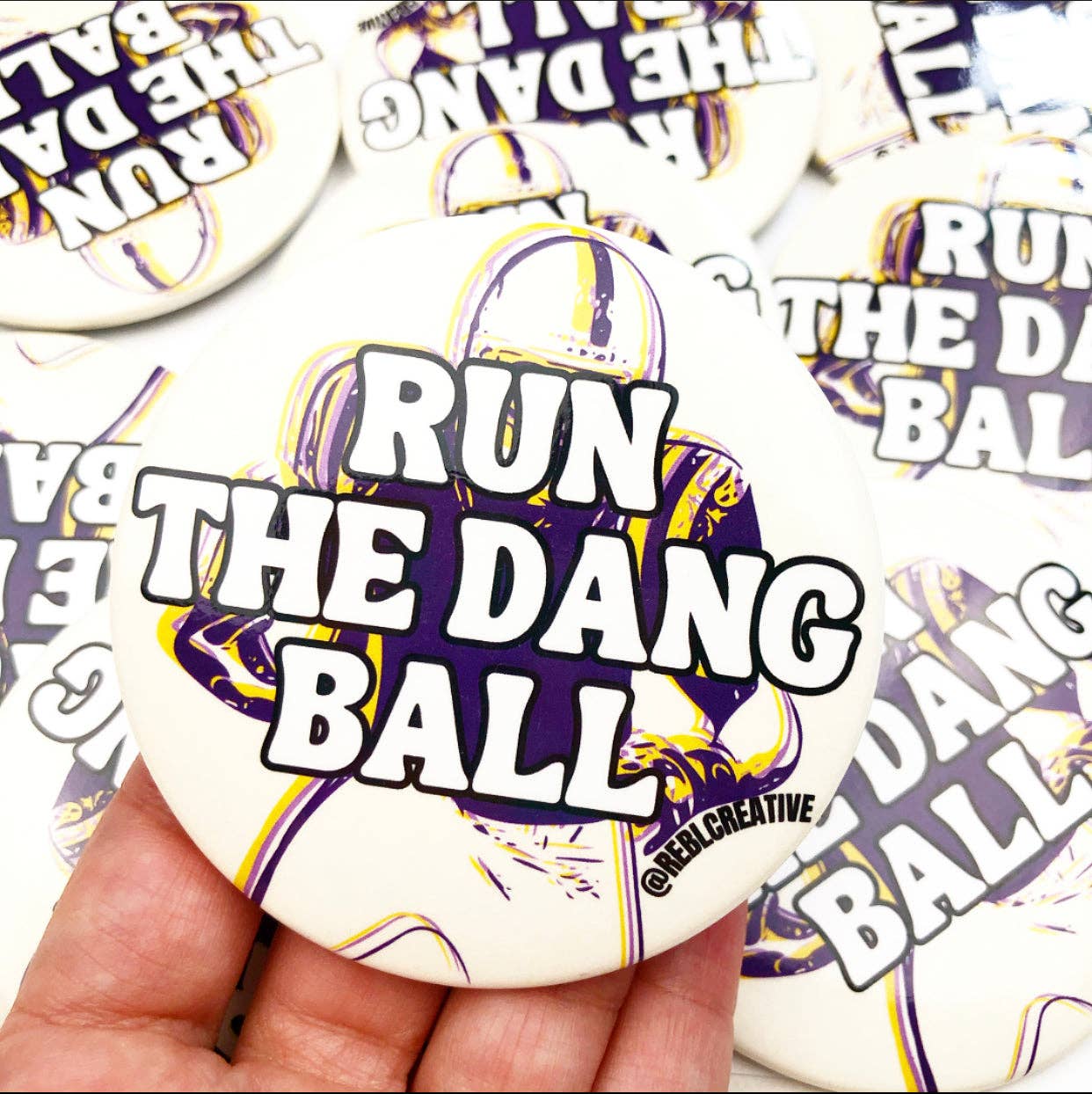 Run The Dang Ball - Purple and Yellow - Game Day Button-Dear Me Southern Boutique, located in DeRidder, Louisiana