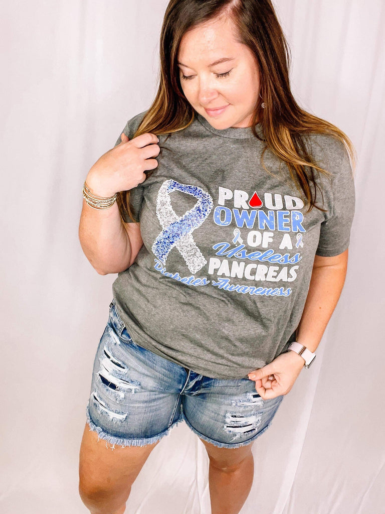 Proud Owner of a Useless Pancreas Tee-Tops-Dear Me Southern Boutique, located in DeRidder, Louisiana